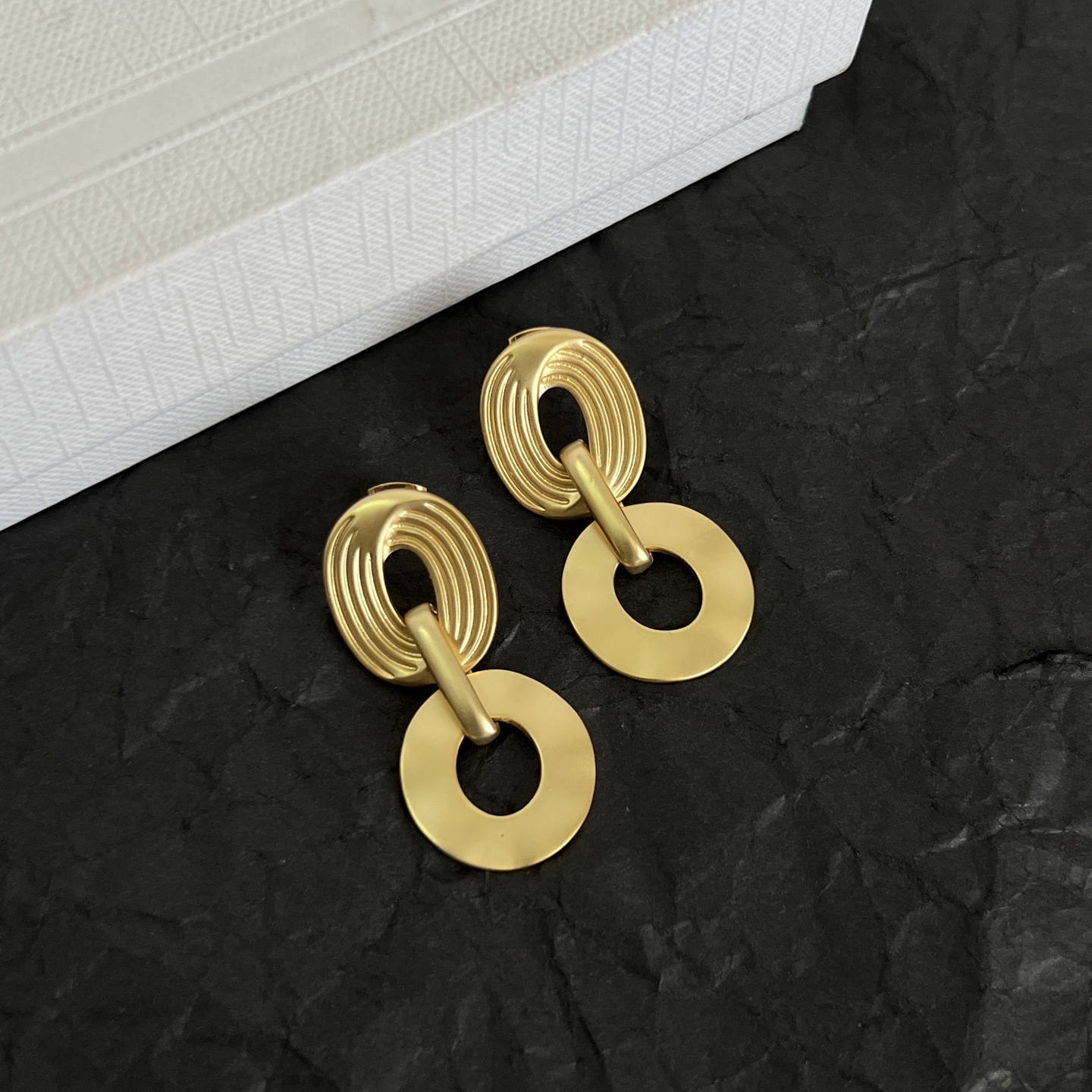 Celine Ridged Oval Link Disc Drop Earrings earrings Matte gold-tone metal no gemstones also available in matte silver-tone metal 3 5cm drop length
