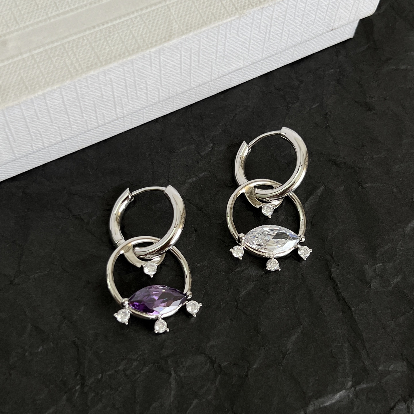 Celine Crystal Interlocking Hoop Earrings earrings Silver-toned metal with clear and purple faceted crystals One Size hoop diameter approx 1 5cm