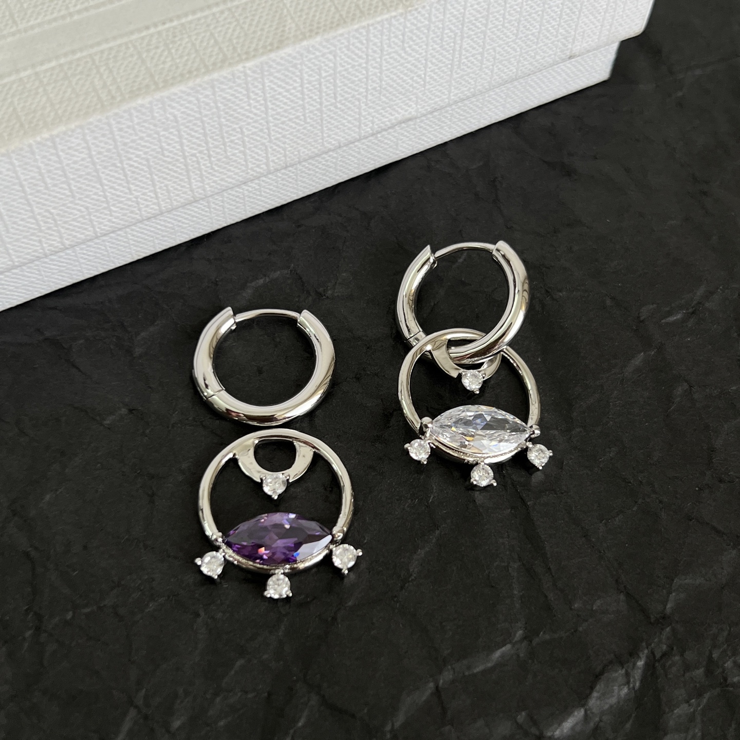 Celine Crystal Interlocking Hoop Earrings earrings Silver-toned metal with clear and purple faceted crystals One Size hoop diameter approx 1 5cm