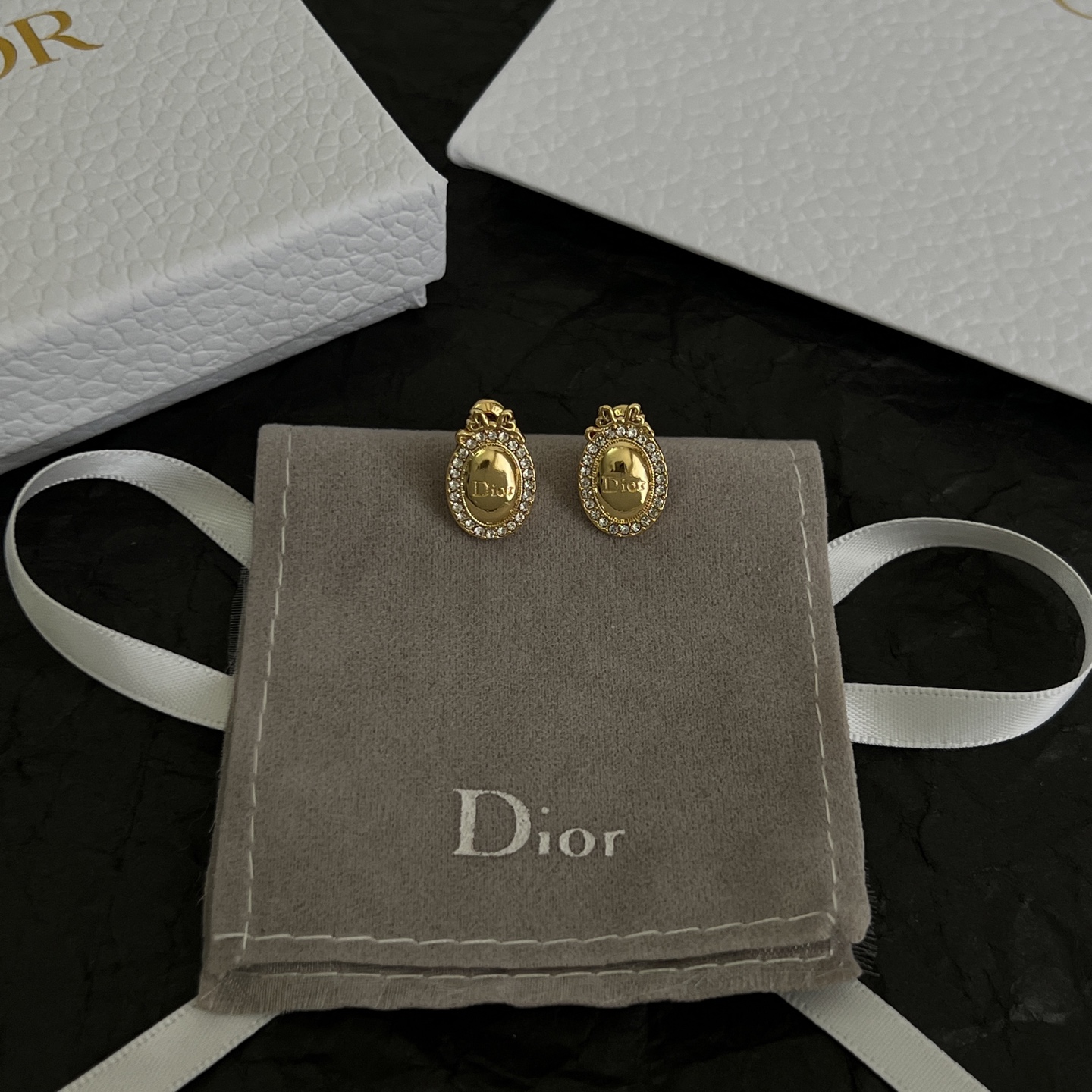 Dior Oval Logo Crystal Stud Earrings earrings gold-tone metal with clear crystal accents 1 2cm length