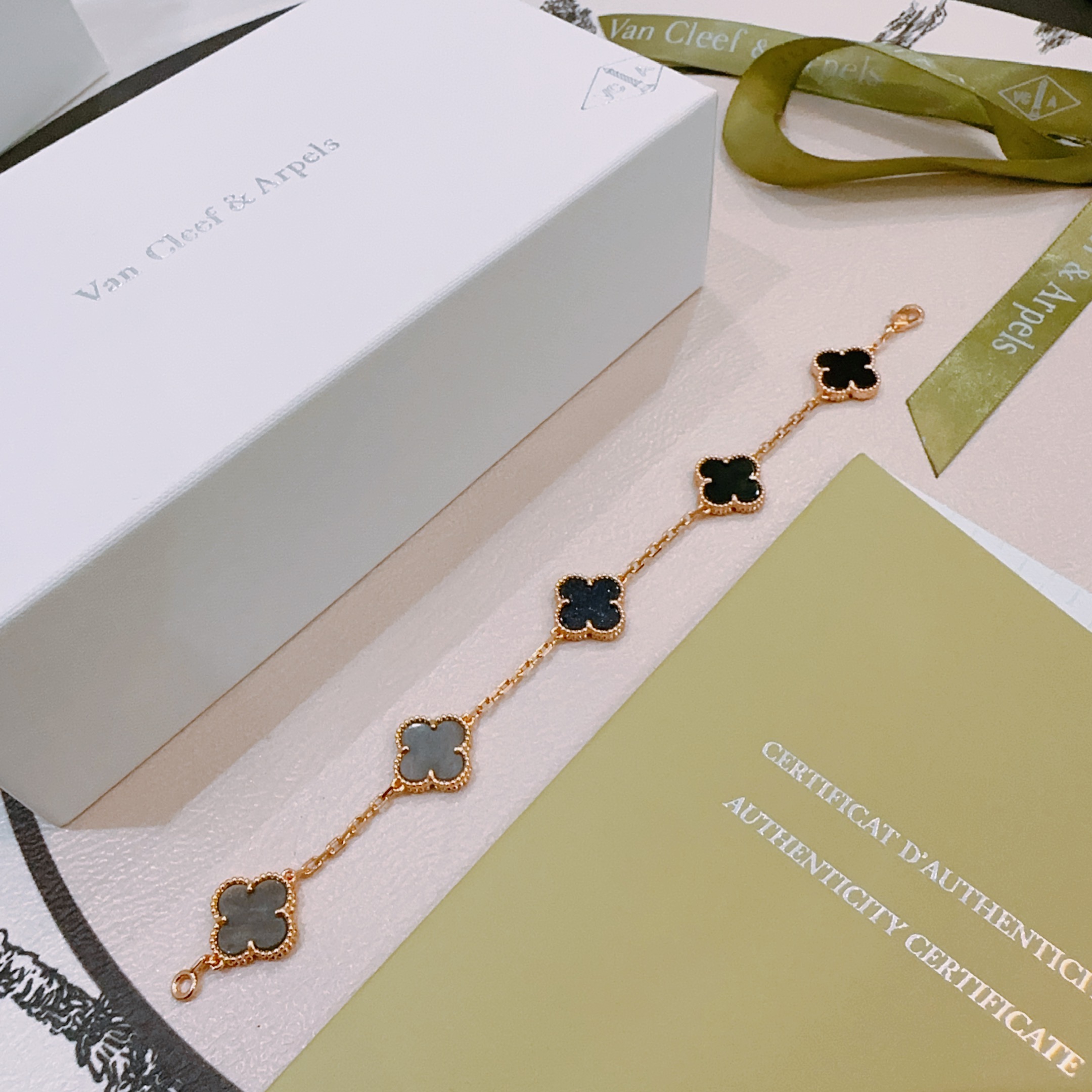 Van Cleef Arpels Alhambra bracelet Rose gold metal with black onyx dark gray mother-of-pearl and blue sandstone clover motifs 17cm