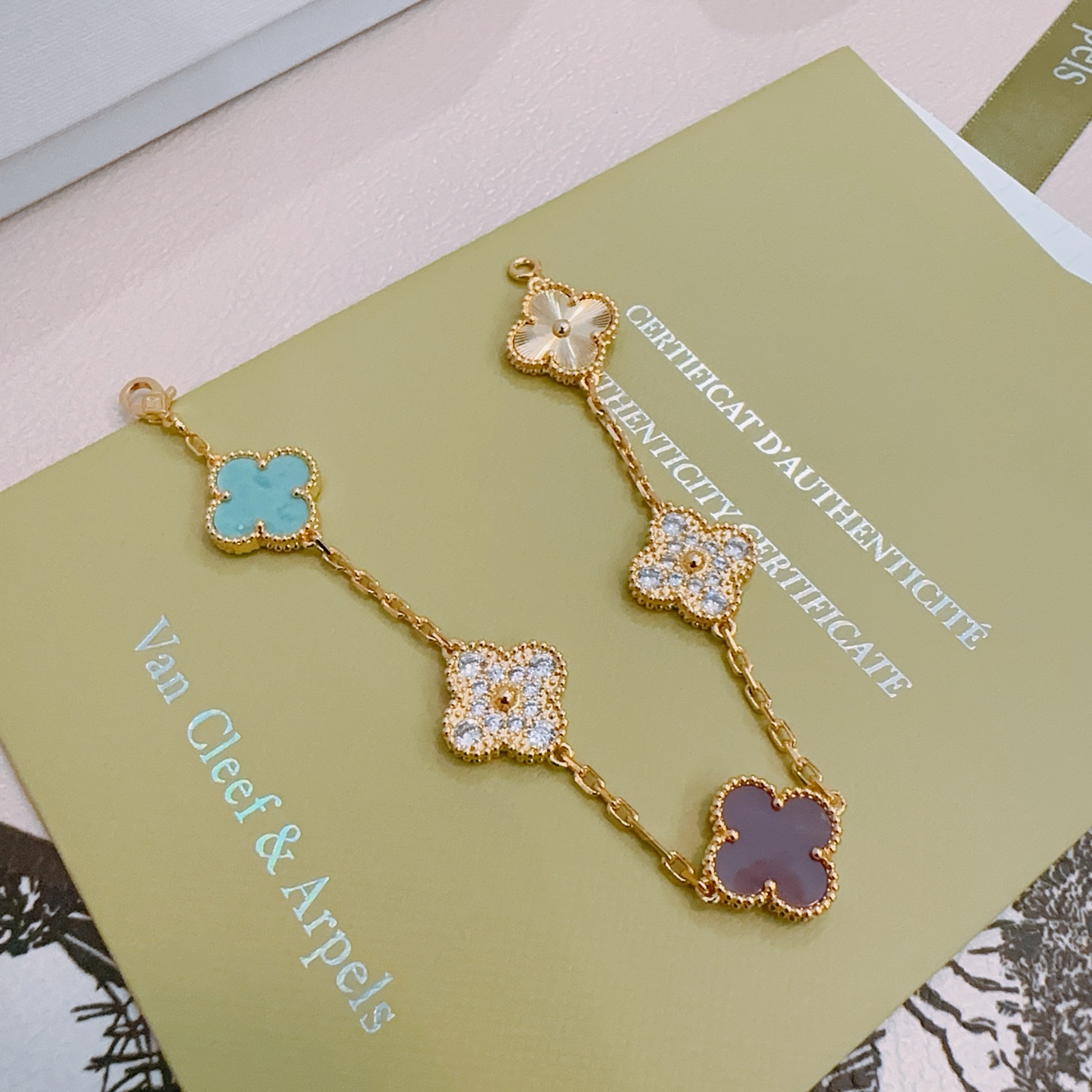 Van Cleef Arpels Alhambra bracelet yellow gold with turquoise purple rhodonite clear diamond and guilloche gold four-leaf clover motifs 17cm