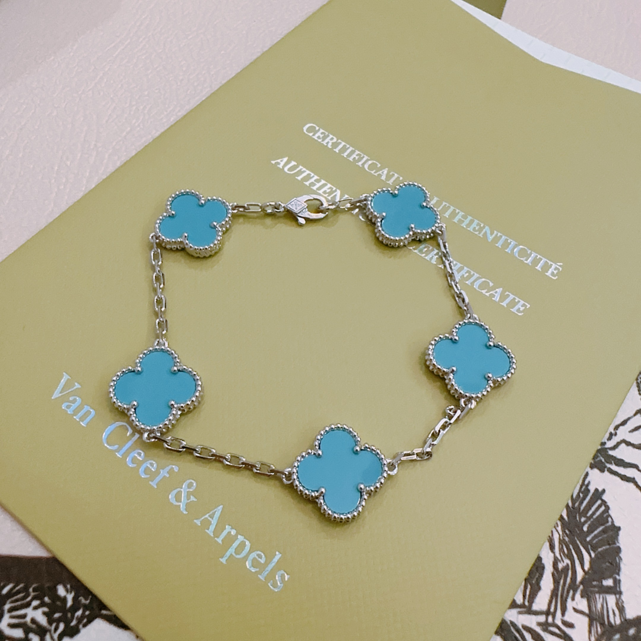 Van Cleef Arpels Alhambra bracelet silver-toned metal with turquoise blue clover inlays 17cm