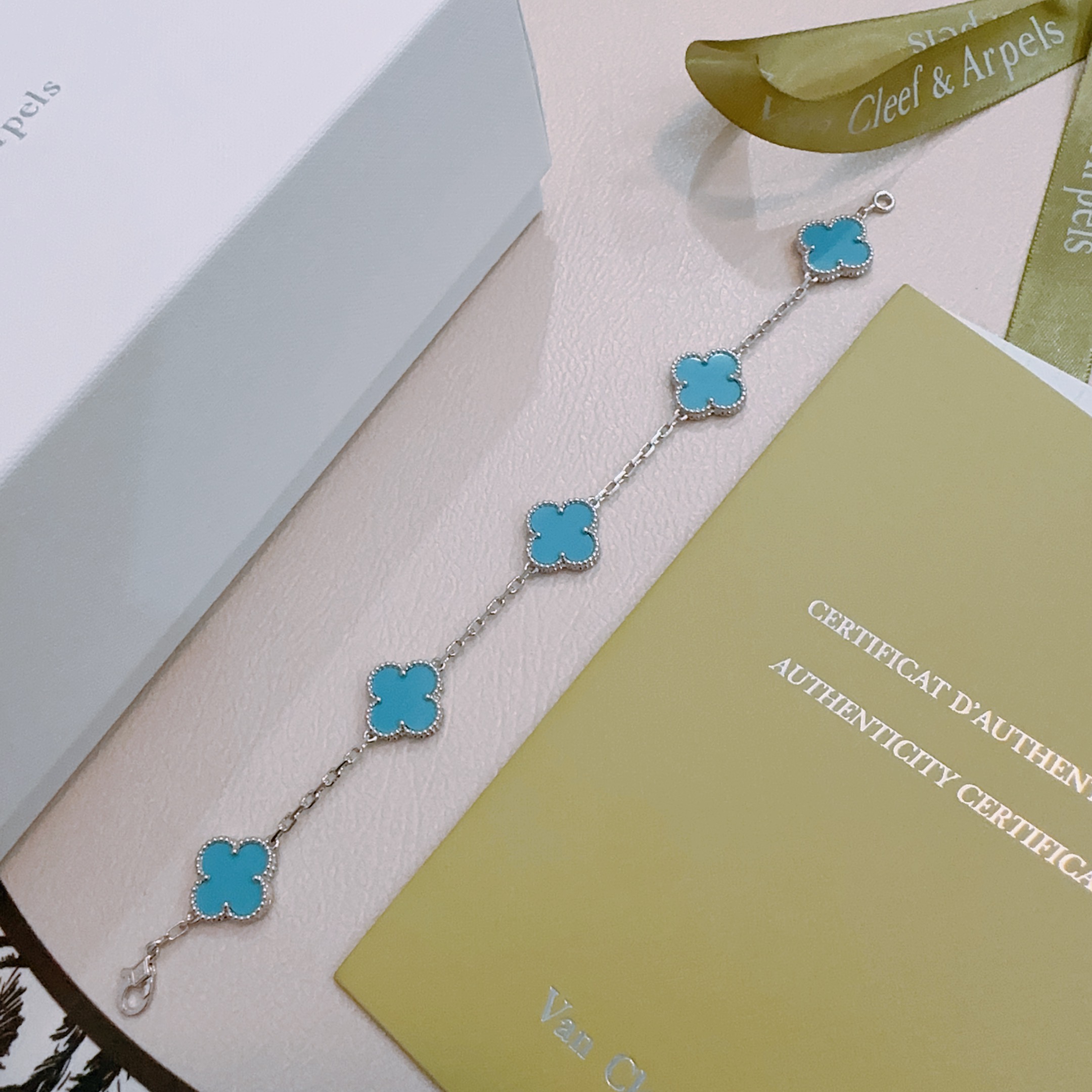 Van Cleef Arpels Alhambra bracelet silver-toned metal with turquoise blue clover inlays 17cm