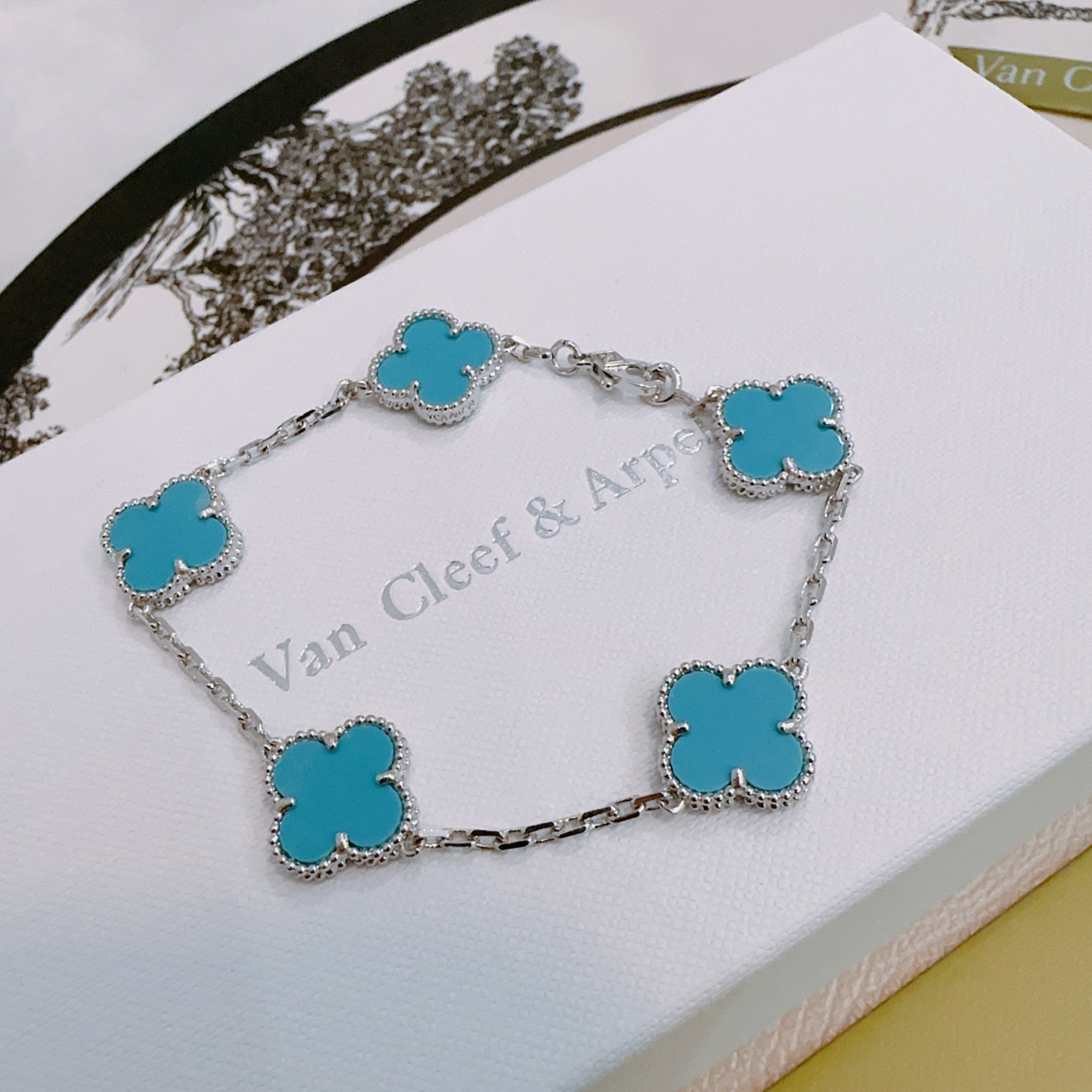 Van Cleef Arpels Alhambra bracelet silver-toned metal with turquoise blue clover inlays 17cm