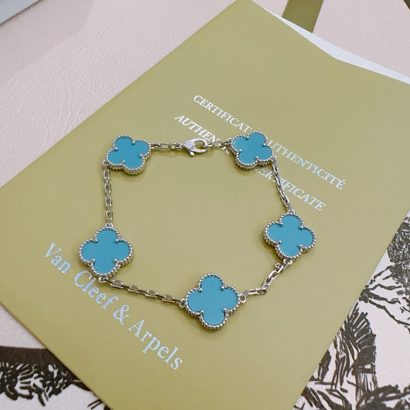 Van Cleef Arpels Alhambra bracelet silver-toned metal with turquoise blue clover inlays 17cm
