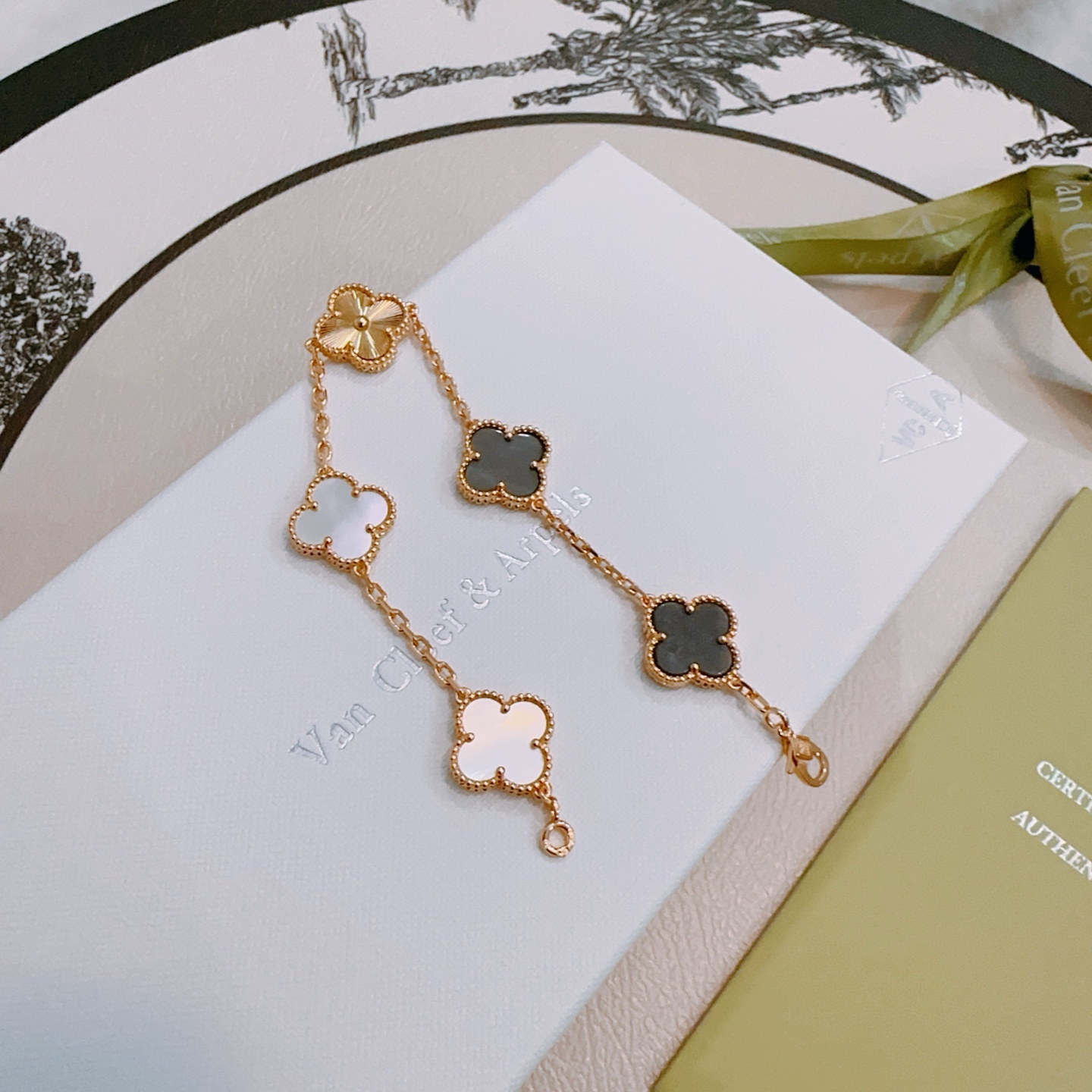 Van Cleef Arpels Alhambra bracelet Rose gold metal with white mother-of-pearl gray mother-of-pearl and rose gold guilloche clover motifs 19cm