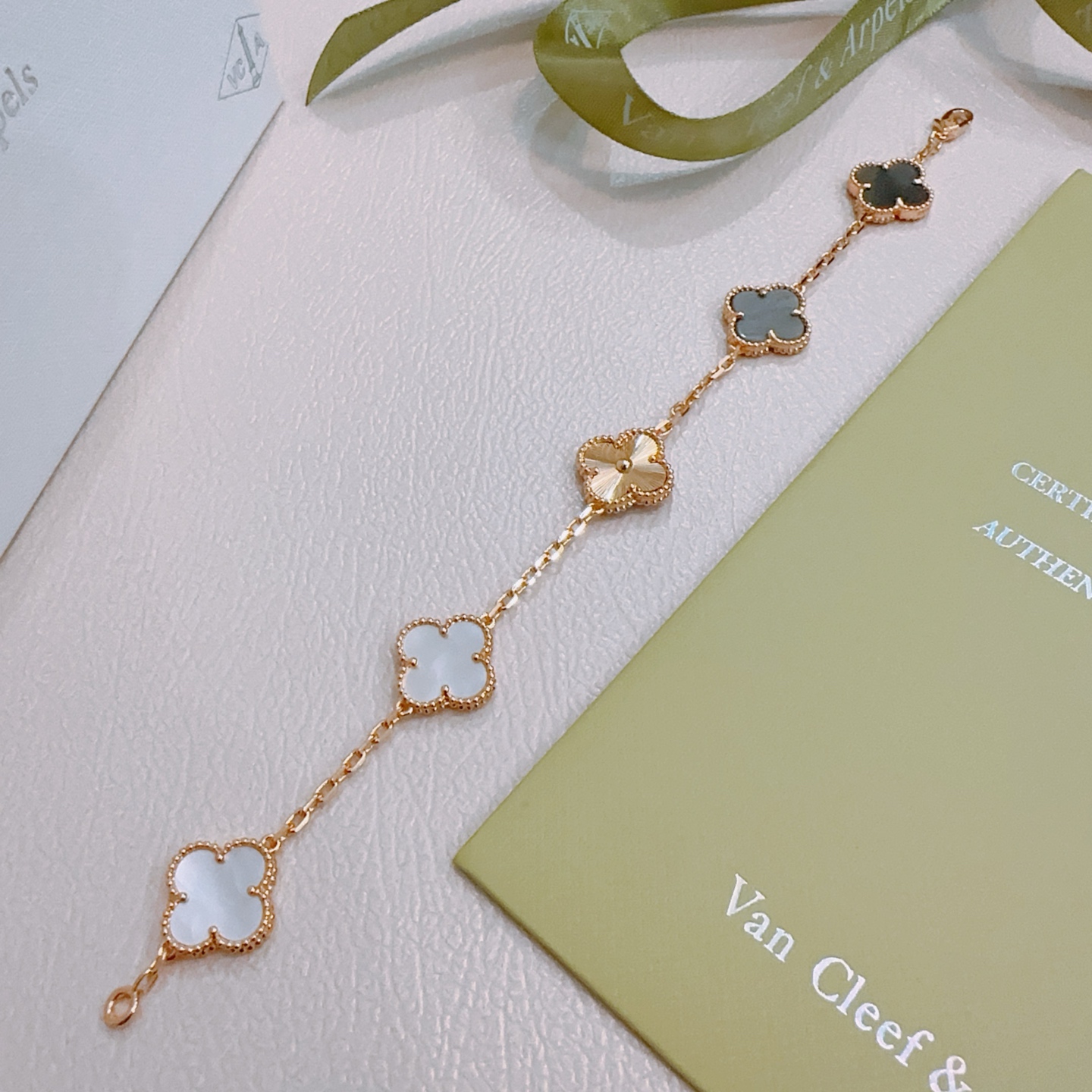 Van Cleef Arpels Alhambra bracelet Rose gold metal with white mother-of-pearl gray mother-of-pearl and rose gold guilloche clover motifs 19cm