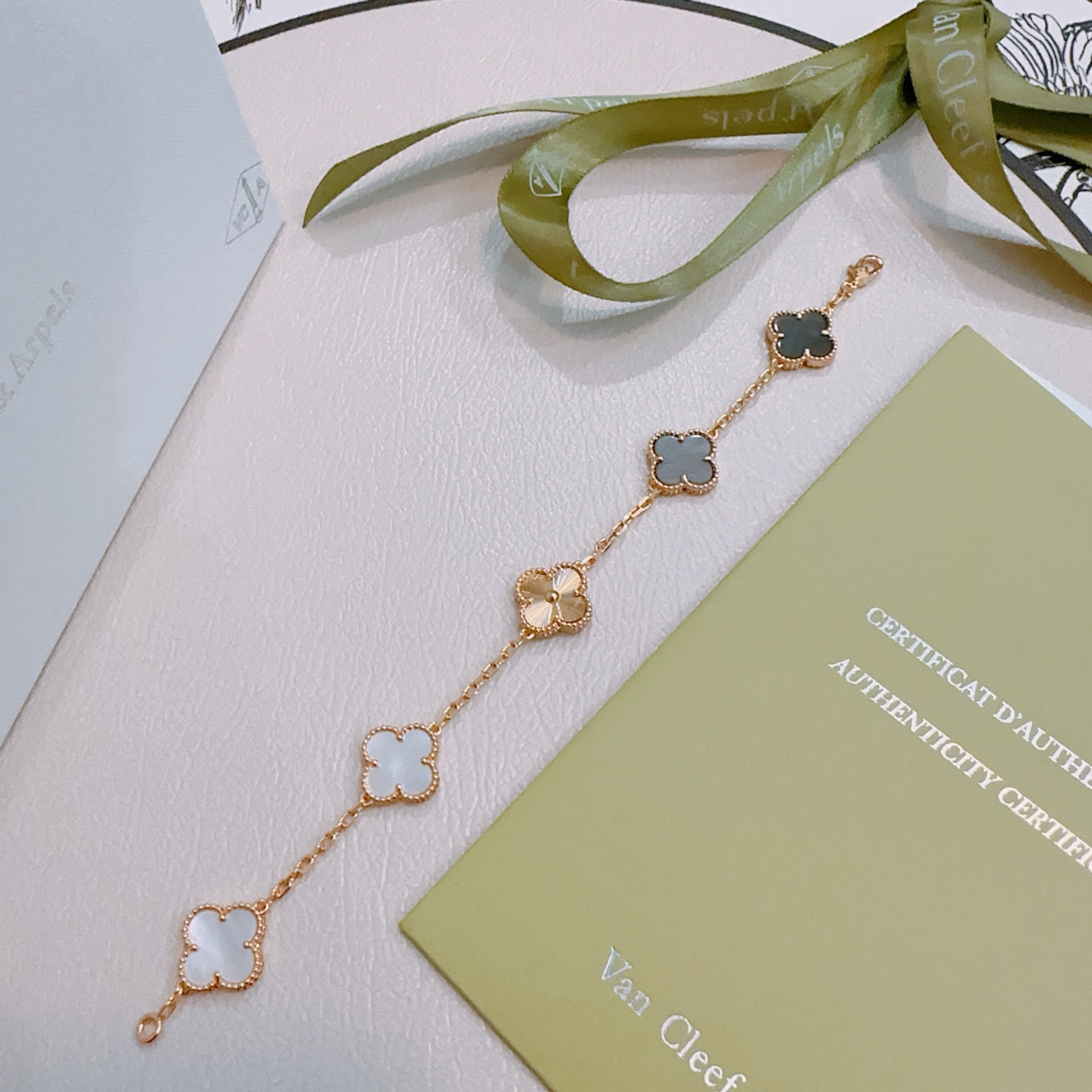 Van Cleef Arpels Alhambra bracelet Rose gold metal with white mother-of-pearl gray mother-of-pearl and rose gold guilloche clover motifs 19cm