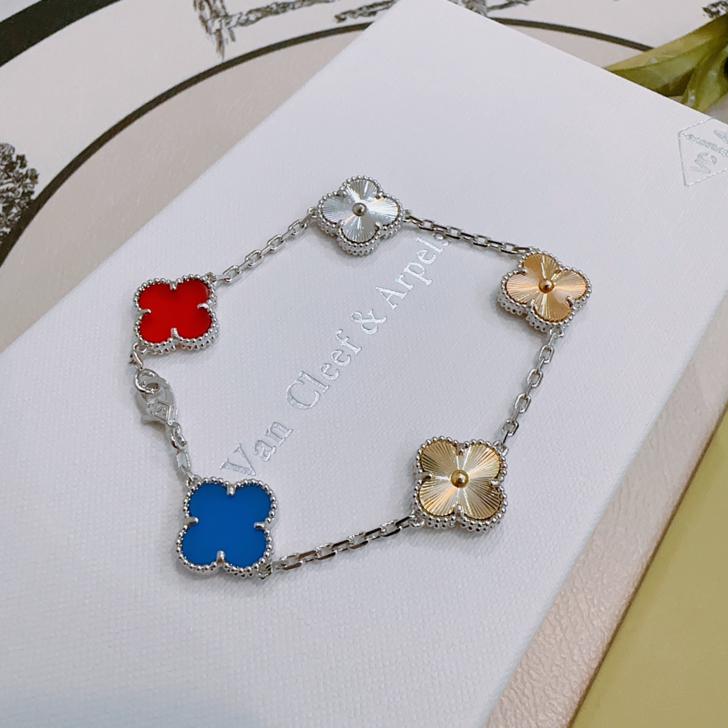 Van Cleef Arpels Alhambra bracelet Silver-toned metal with red blue gold and silver four-leaf clover motifs 17cm