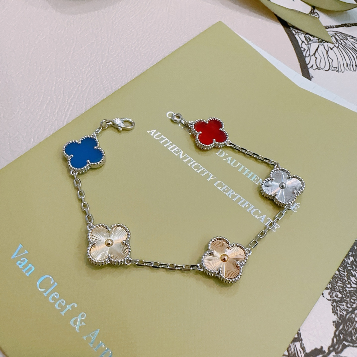 Van Cleef Arpels Alhambra bracelet Silver-toned metal with red blue gold and silver four-leaf clover motifs 17cm
