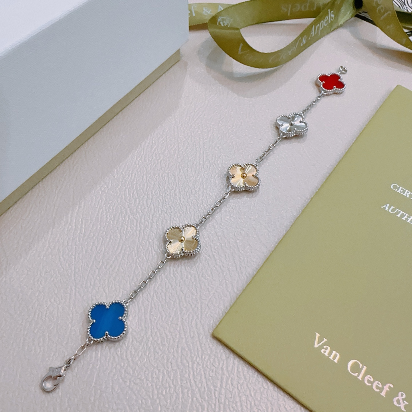 Van Cleef Arpels Alhambra bracelet Silver-toned metal with red blue gold and silver four-leaf clover motifs 17cm