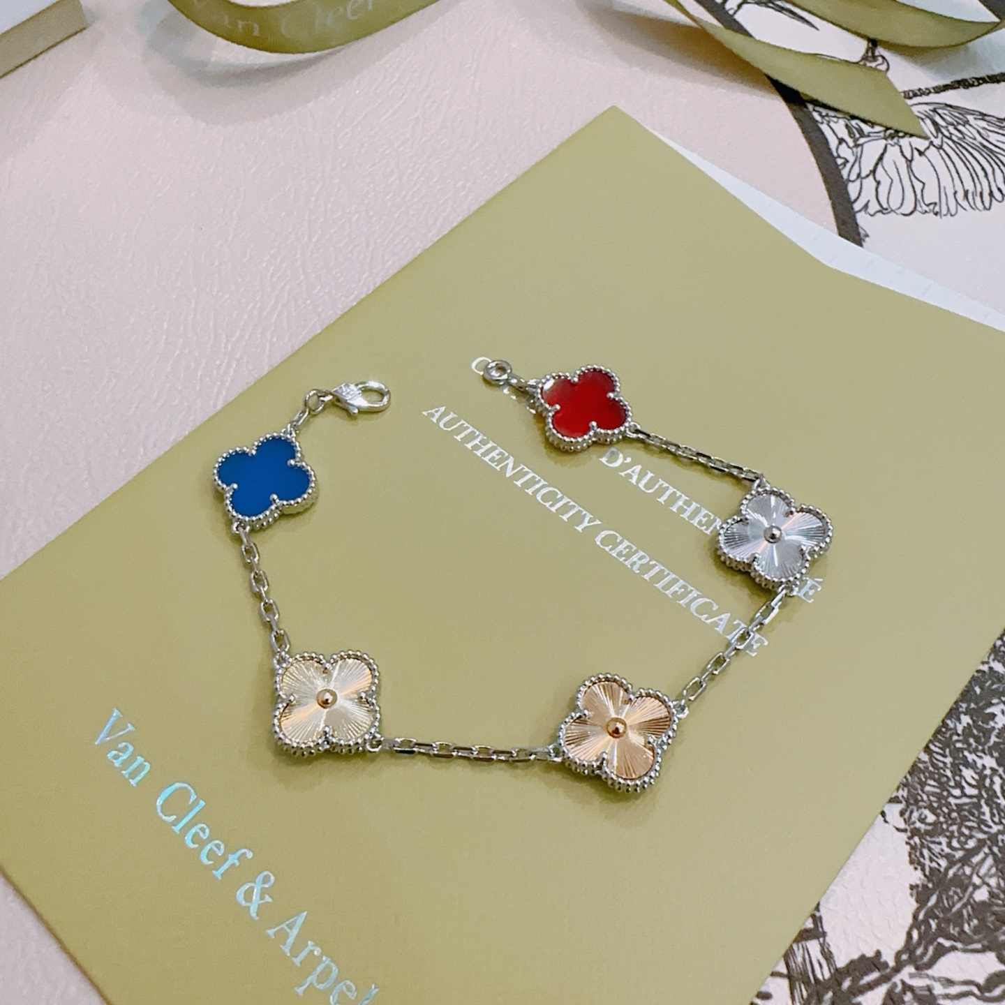 Van Cleef Arpels Alhambra bracelet Silver-toned metal with red blue gold and silver four-leaf clover motifs 17cm