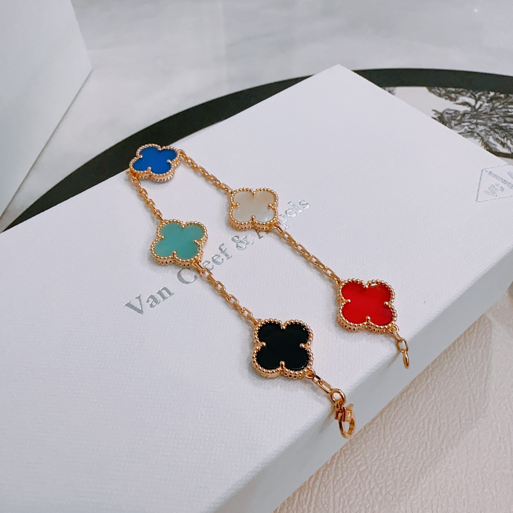 Van Cleef Arpels Alhambra bracelet Rose gold metal with red white mother-of-pearl royal blue turquoise black onyx clover inlays 18cm