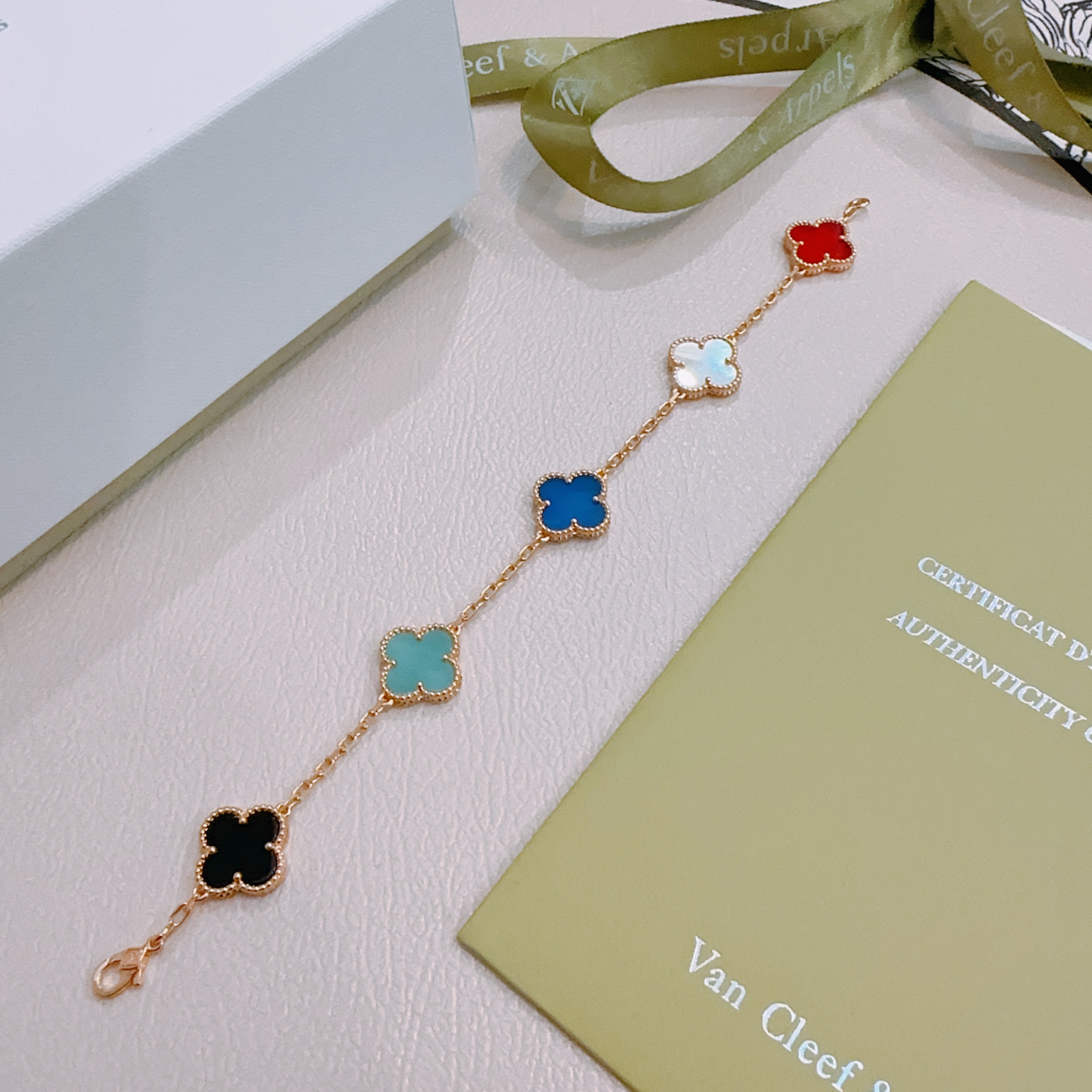 Van Cleef Arpels Alhambra bracelet Rose gold metal with red white mother-of-pearl royal blue turquoise black onyx clover inlays 18cm