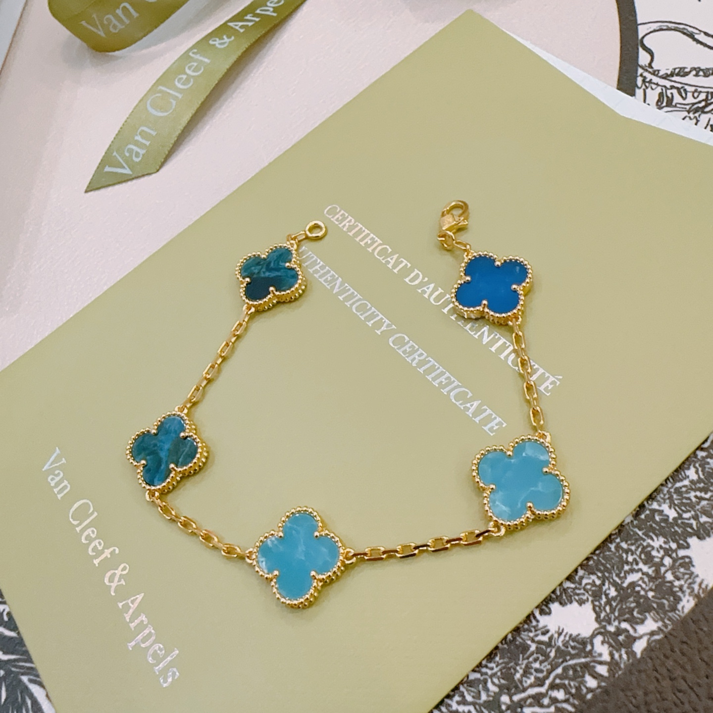 Van Cleef Arpels Alhambra bracelet Yellow gold with multi-tone blue clover stones royal blue sky blue teal blue 18cm