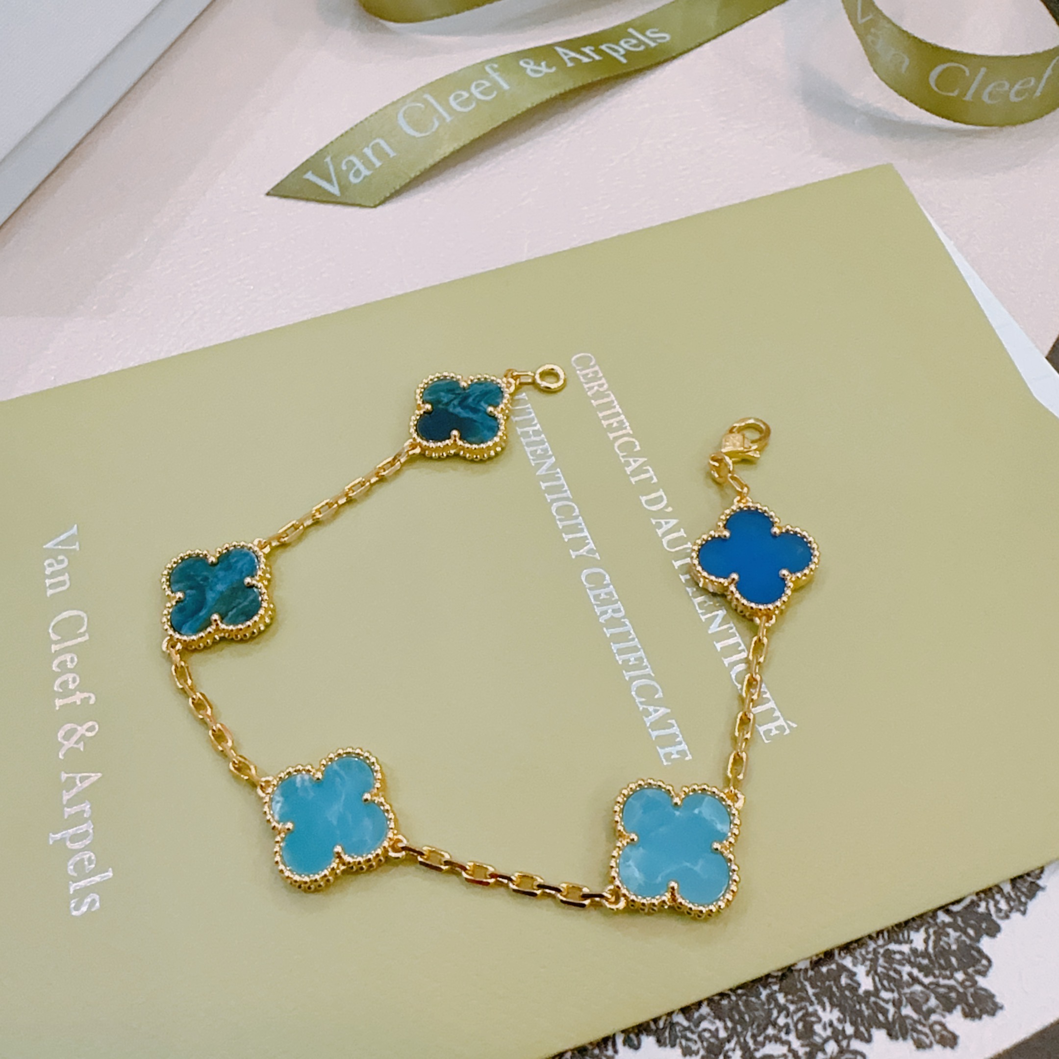 Van Cleef Arpels Alhambra bracelet Yellow gold with multi-tone blue clover stones royal blue sky blue teal blue 18cm