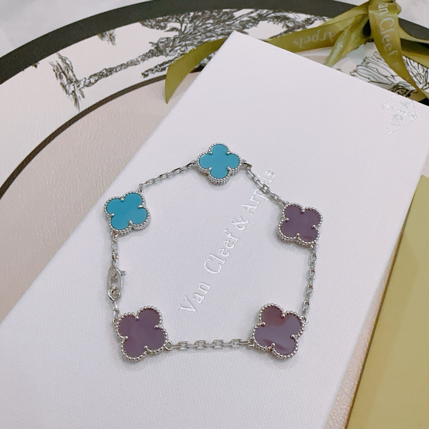 Van Cleef Arpels Alhambra bracelet Silver-toned metal with turquoise blue and purple clover inlays 18cm