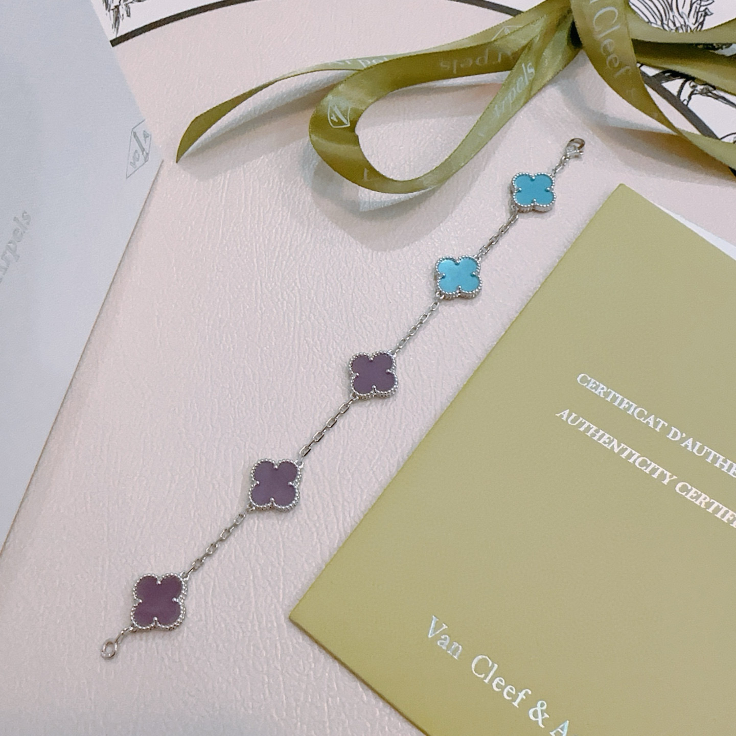Van Cleef Arpels Alhambra bracelet Silver-toned metal with turquoise blue and purple clover inlays 18cm
