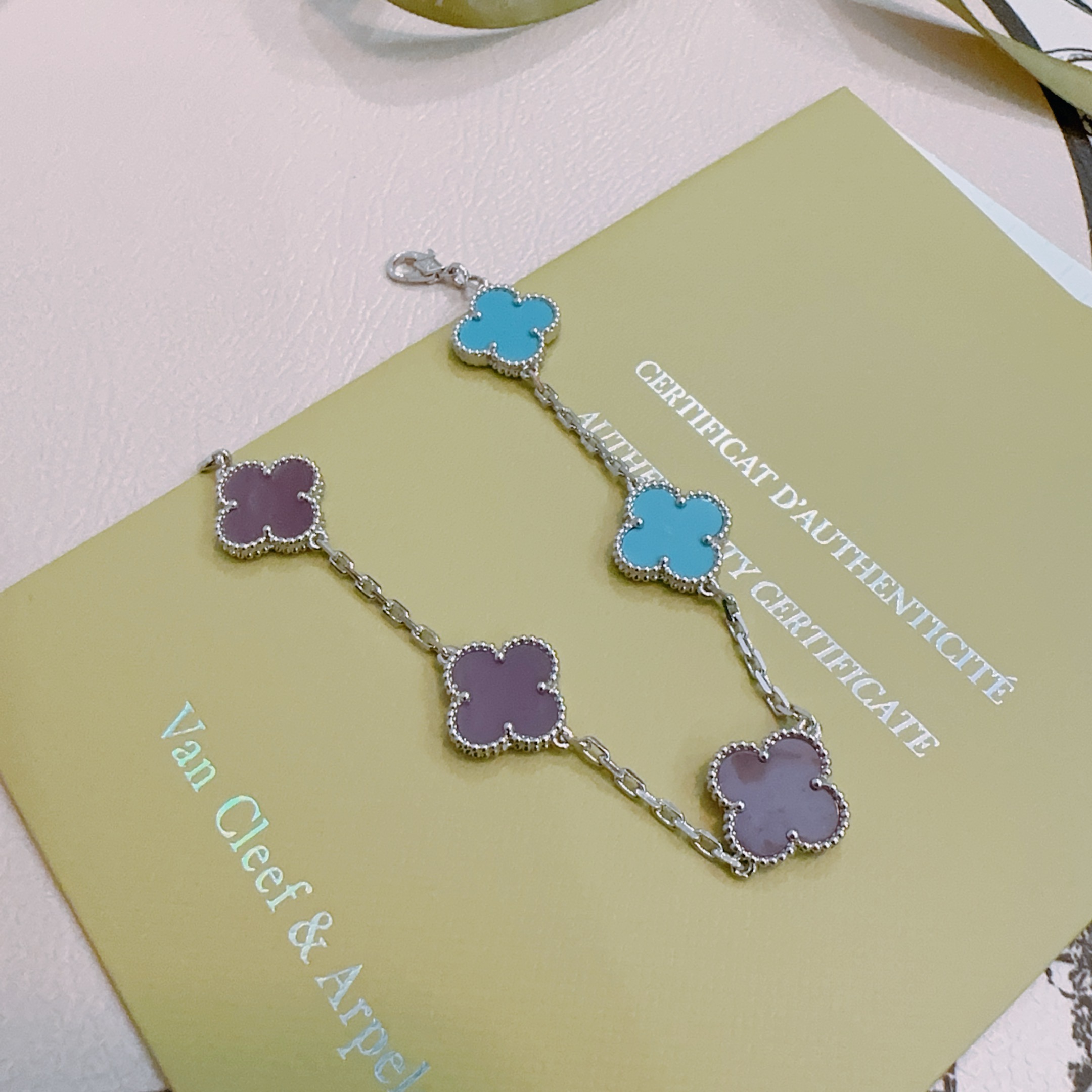Van Cleef Arpels Alhambra bracelet Silver-toned metal with turquoise blue and purple clover inlays 18cm