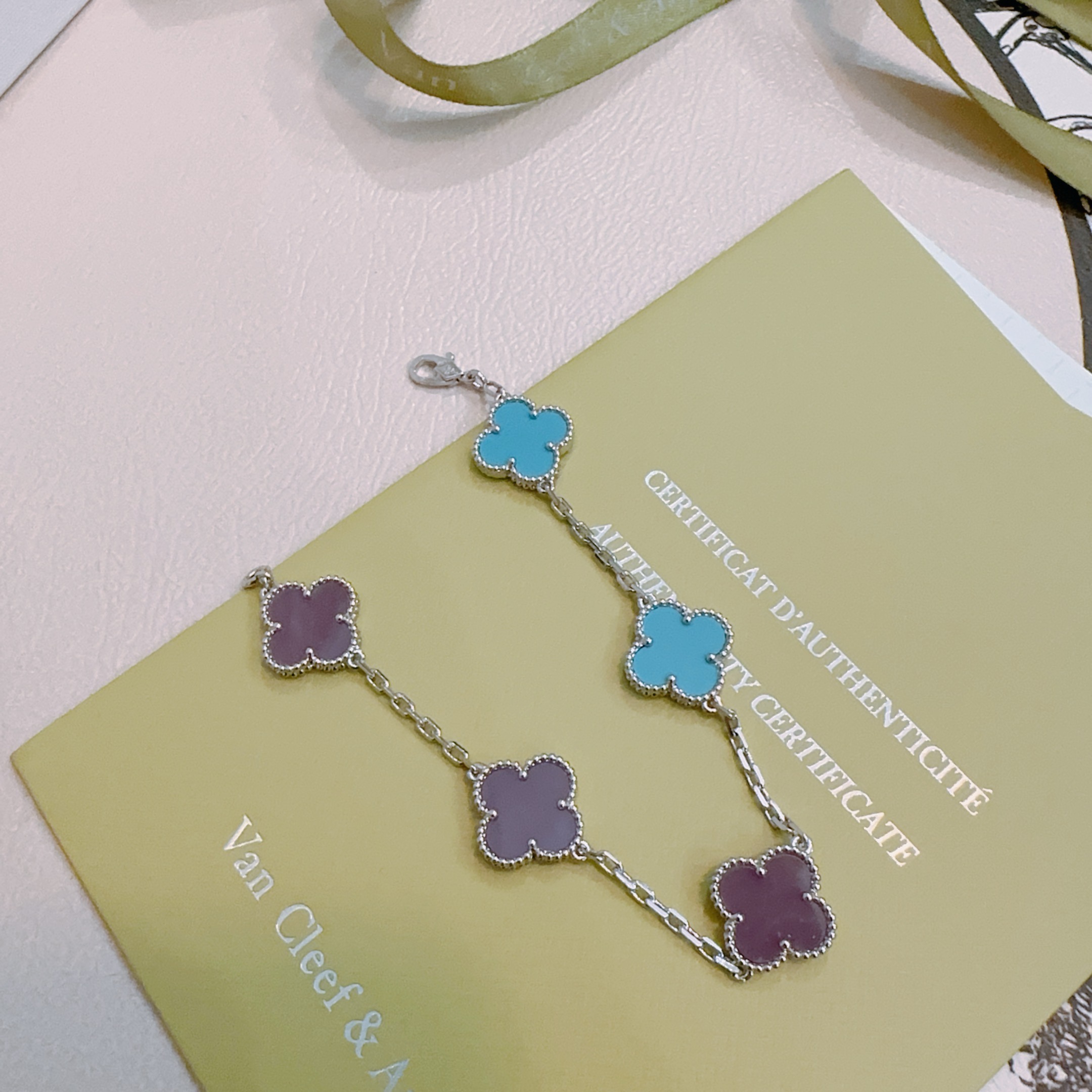 Van Cleef Arpels Alhambra bracelet Silver-toned metal with turquoise blue and purple clover inlays 18cm