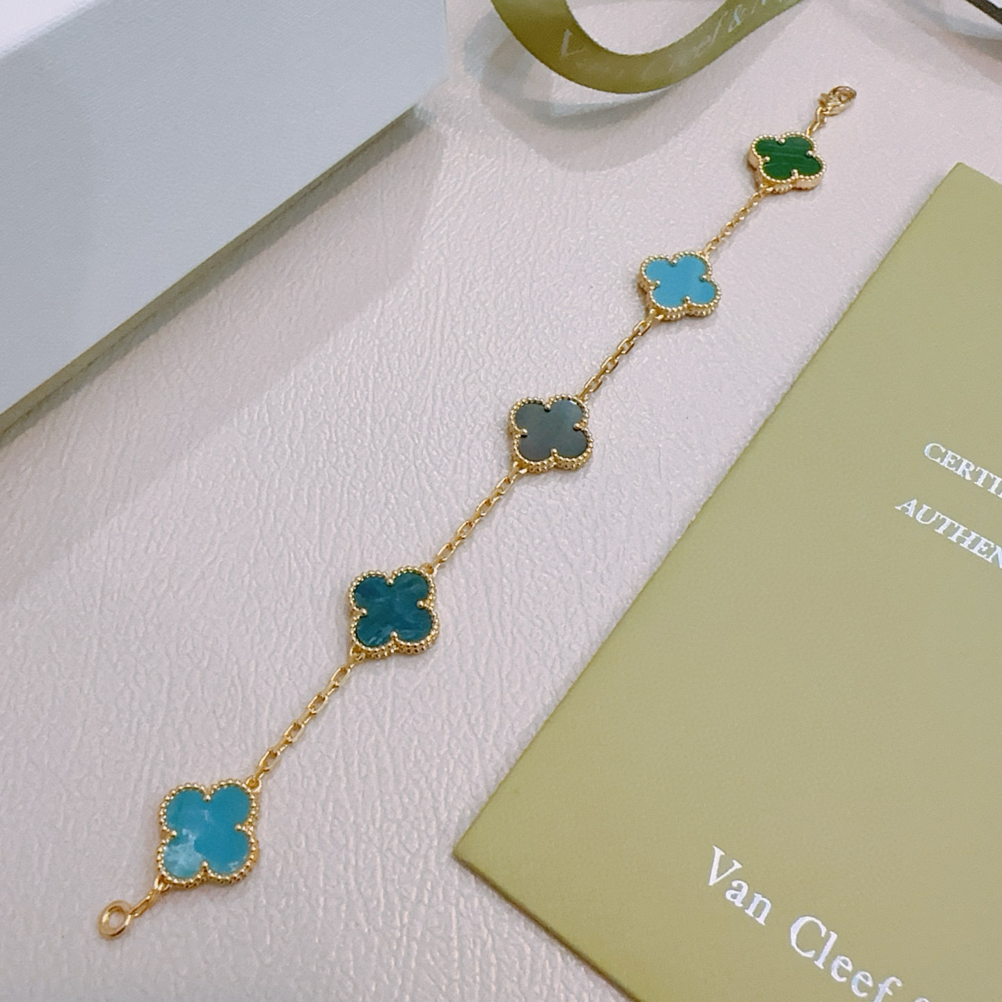 Van Cleef Arpels Alhambra bracelet Gold metal with multicolor clover inlays gray teal turquoise green 18cm