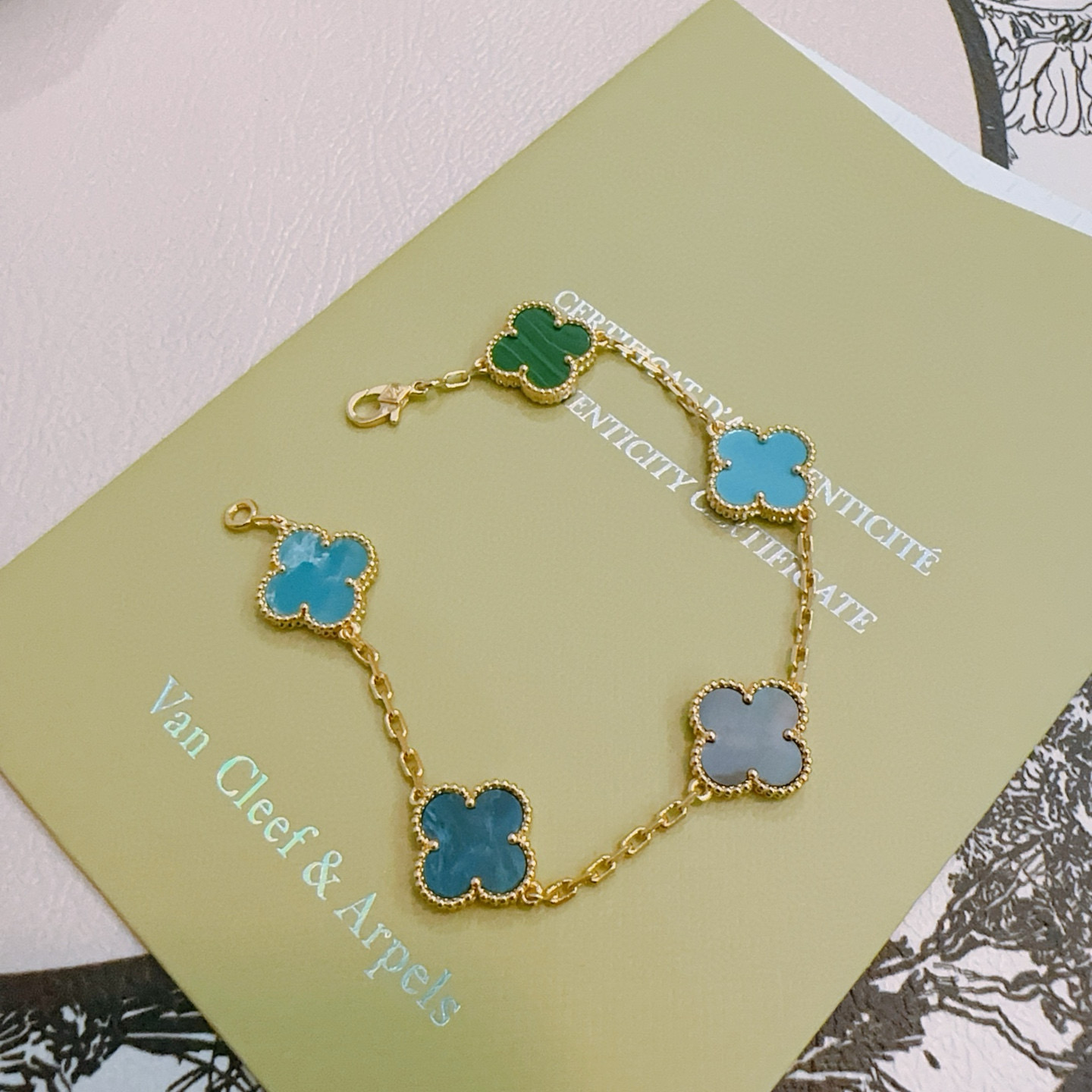 Van Cleef Arpels Alhambra bracelet Gold metal with multicolor clover inlays gray teal turquoise green 18cm