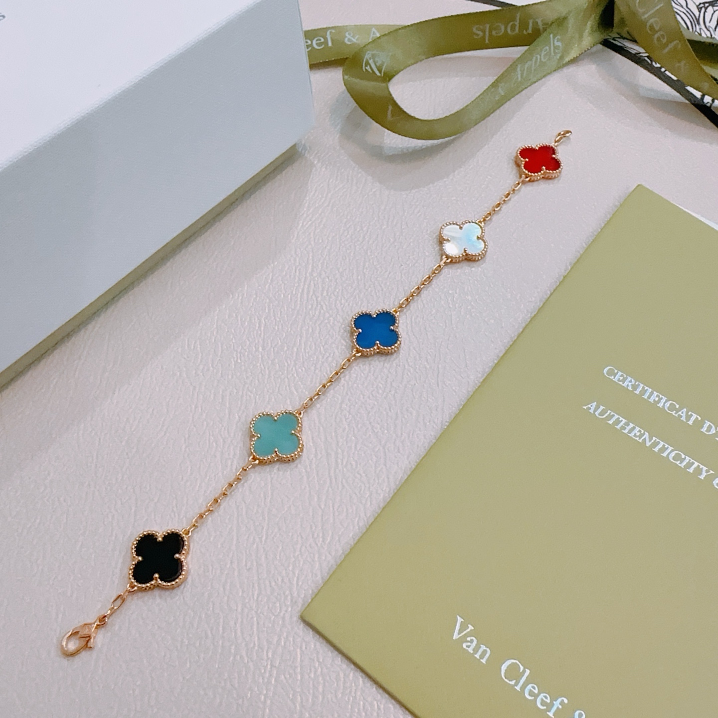 Van Cleef Arpels Alhambra bracelet Rose gold metal with red carnelian white mother-of-pearl blue agate turquoise black onyx clover motifs 18cm