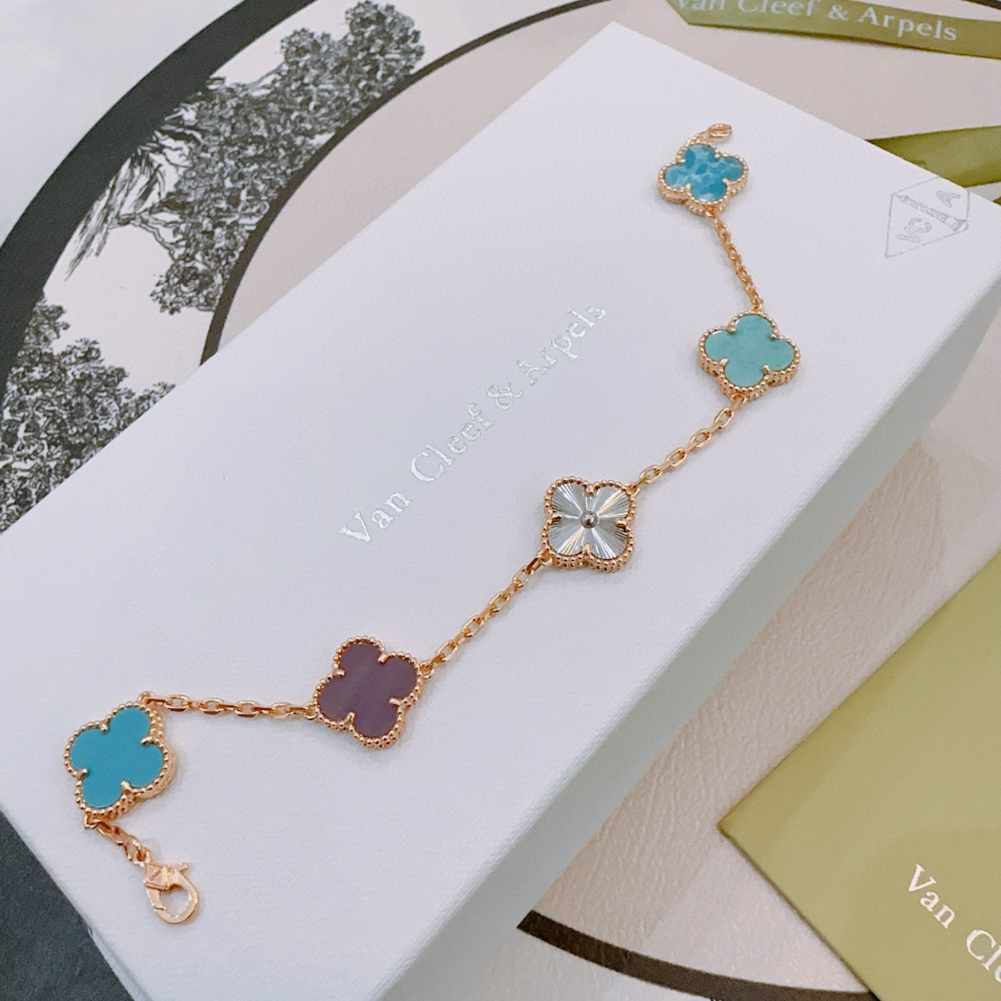 Van Cleef Arpels Alhambra bracelet Rose gold metal with turquoise blue larimar silver guilloche and purple chalcedony clover motifs 17cm