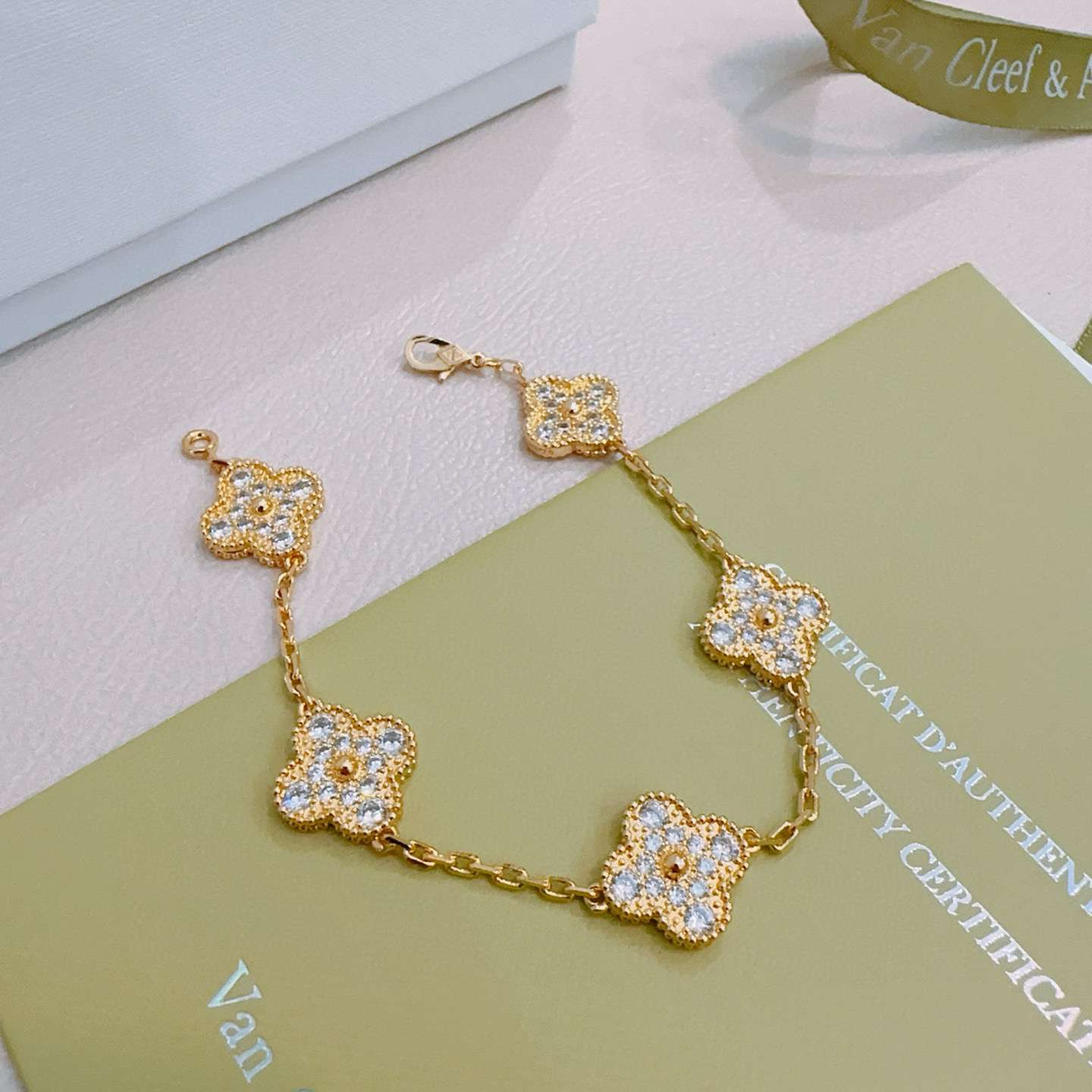 Van Cleef Arpels Alhambra bracelet yellow gold with clear diamond-like stones 18cm