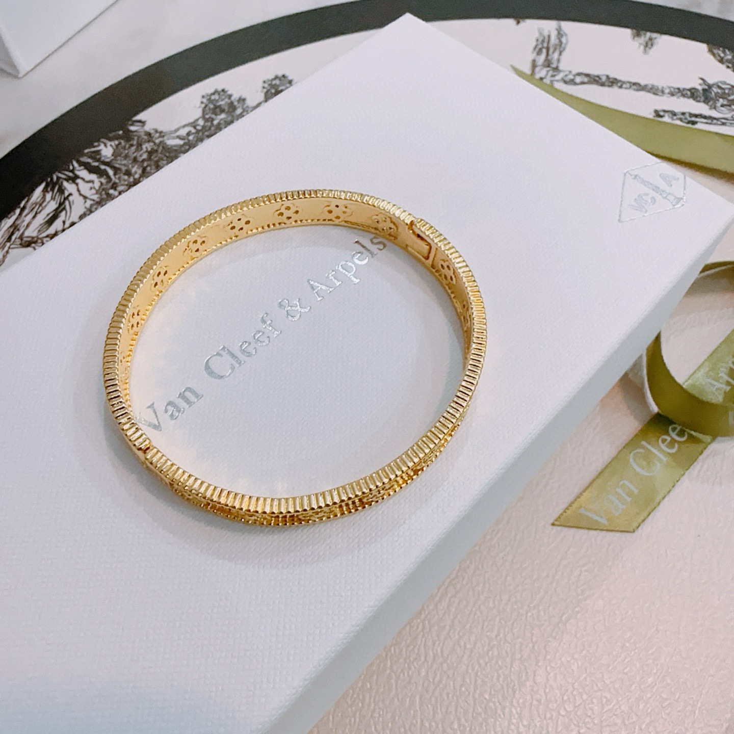 Van Cleef Arpels Perlee Clovers bracelet Yellow gold with clear diamond accents white gold with clear diamond accents 17cm inner circumference