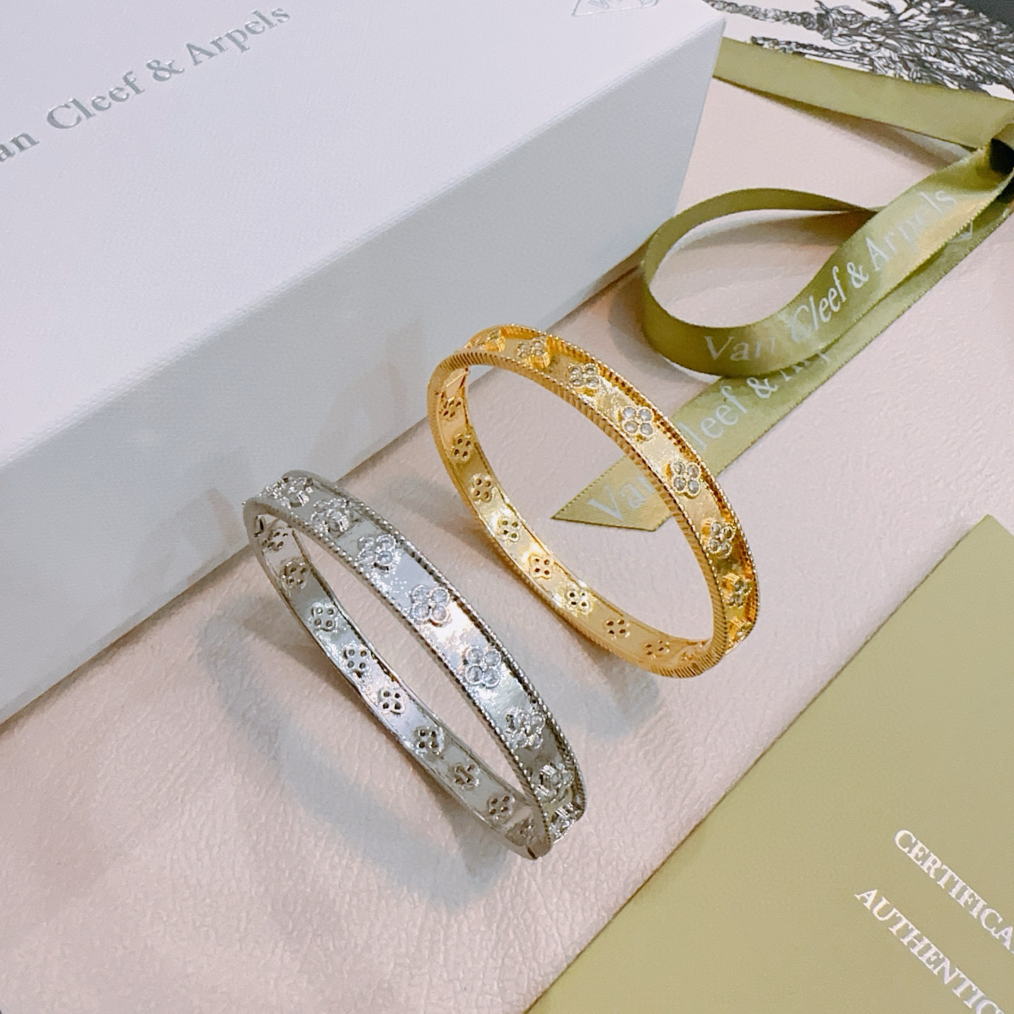 Van Cleef Arpels Perlee Clovers bracelet Yellow gold with clear diamond accents white gold with clear diamond accents 17cm inner circumference