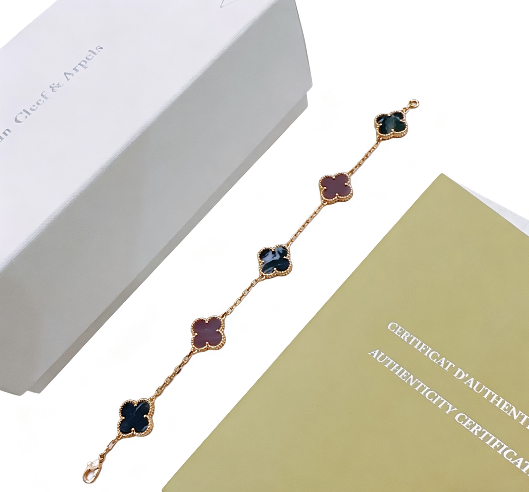 Van Cleef Arpels Bracelet Vintage Alhambra Or jaune avec motifs pietersite bleu foncé et trèfle rhodonite violette 18cm