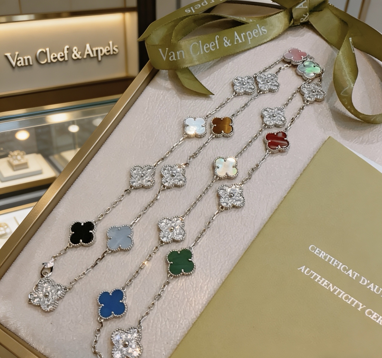 Van Cleef Arpels Alhambra necklace White gold with diamonds black onyx gray chalcedony tiger s eye mother-of-pearl white mother-of-pearl carnelian malachite blue agate pink opal green mother-of-pearl 85cm