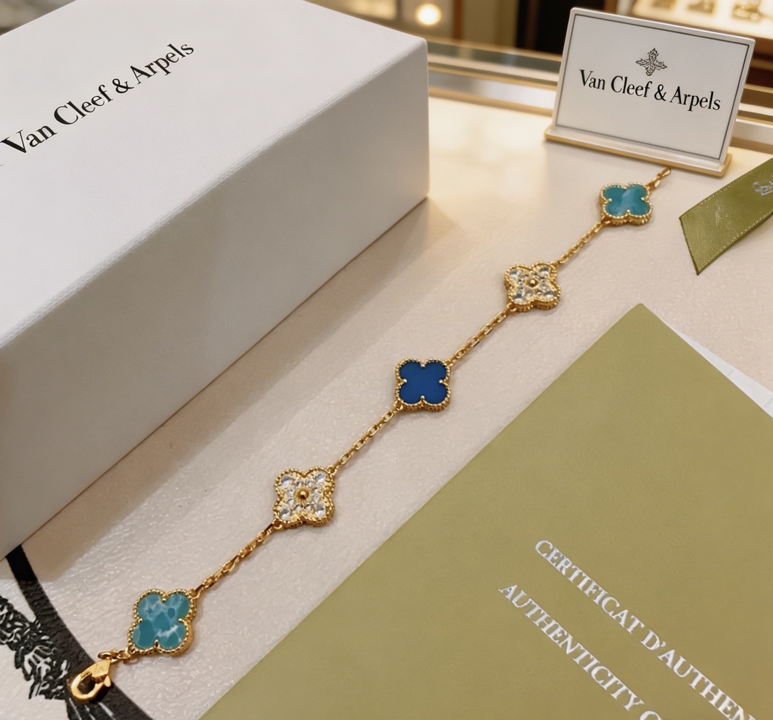 Van Cleef Arpels Alhambra bracelet Yellow gold with blue agate turquoise and diamond-accented four-leaf clover motifs 17cm