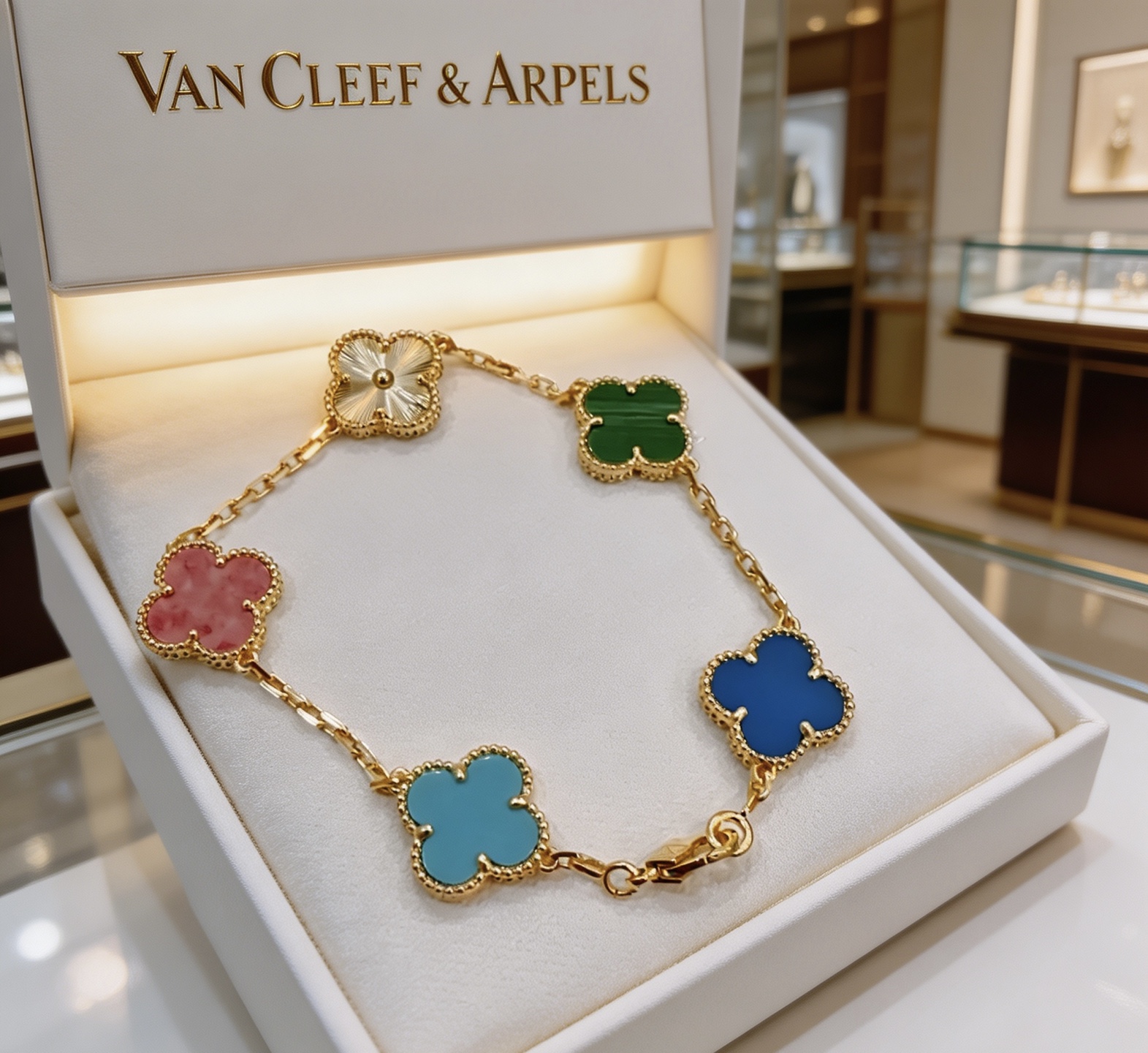Van Cleef Arpels Alhambra bracelet Yellow gold metal with multicolor clover motifs white guilloche green malachite pink rhodonite blue agate light blue turquoise 18cm