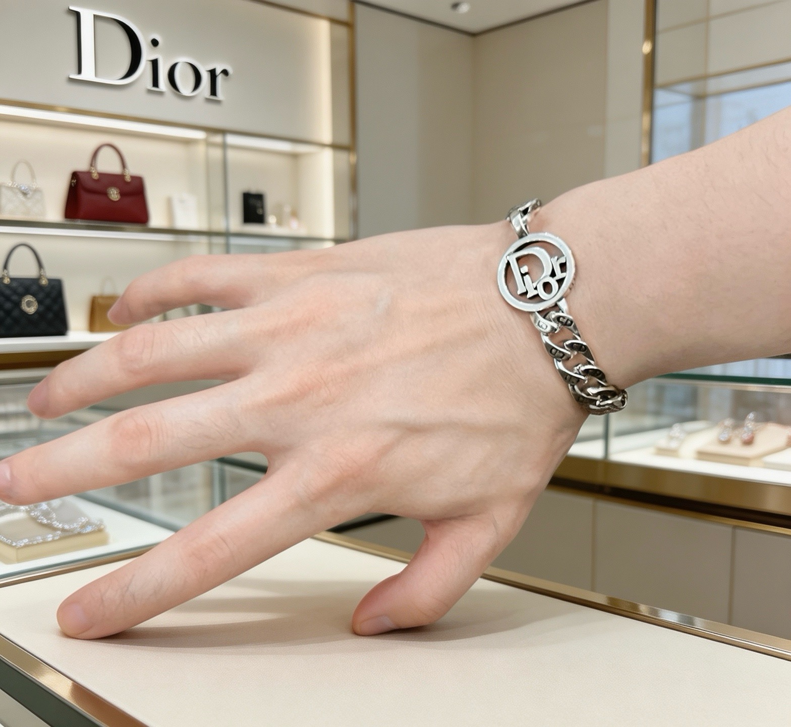 Dior CD Icon Curb Chain bracelet Silver-toned metal with black enamel CD logo detailing 21cm