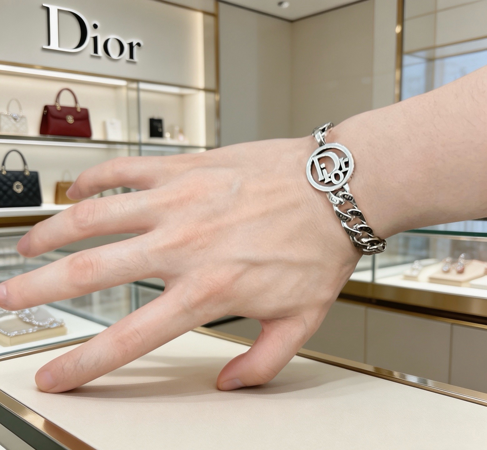 Dior CD Icon Curb Chain bracelet Silver-toned metal with black enamel CD logo detailing 21cm
