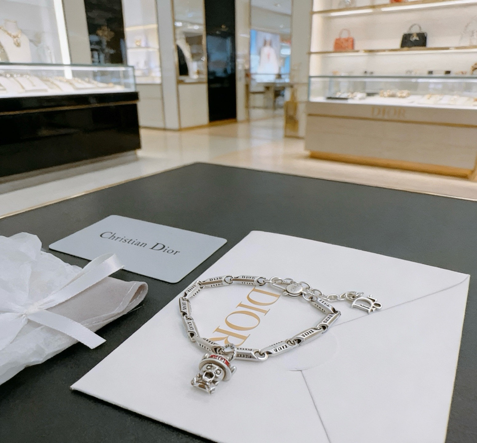 Dior DIOR x Otani Workshop Robot Charm Chain Bracelet bracelet silver-toned metal with red enamel accent 18cm with 3cm extender