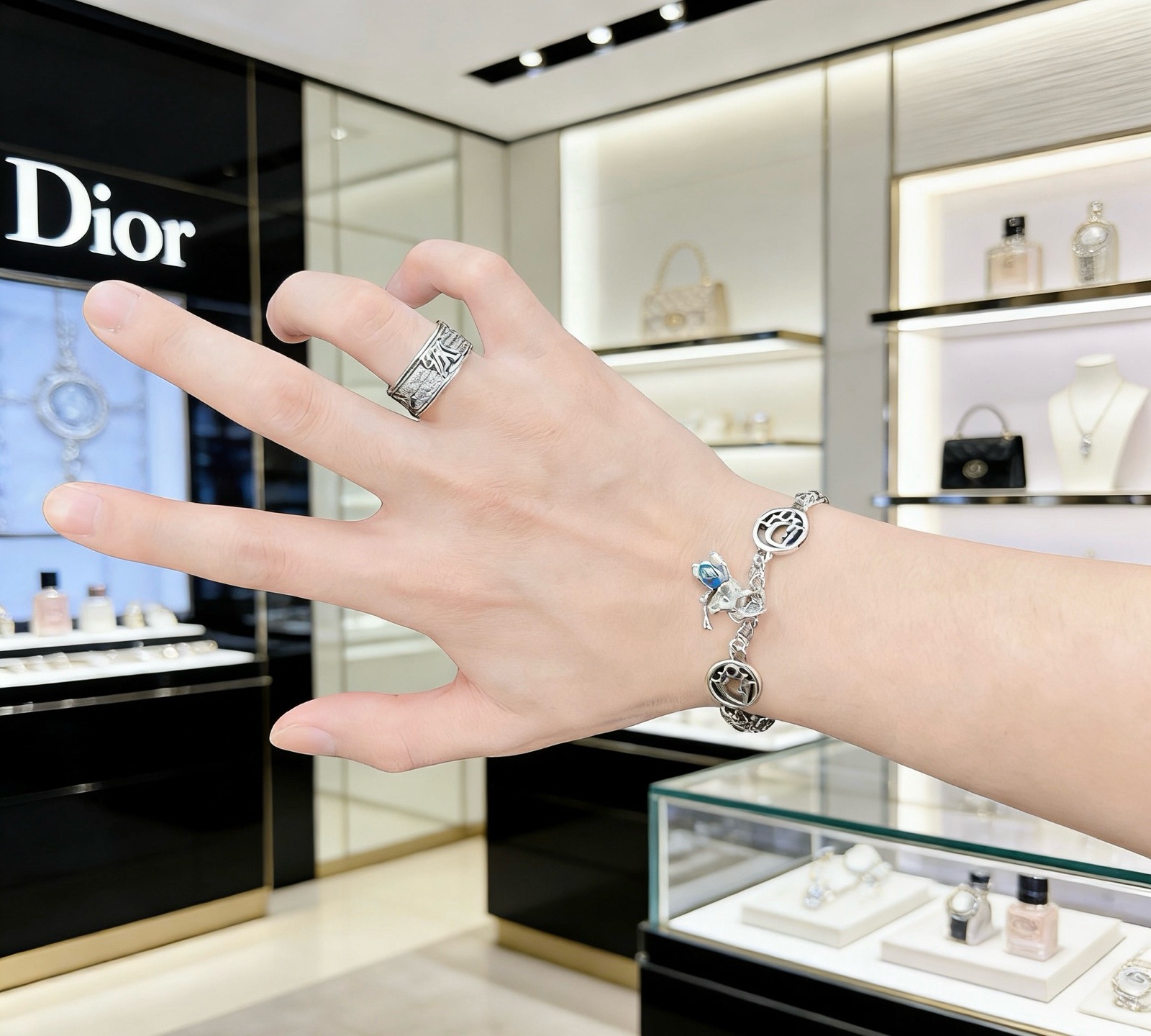 Dior Dior Logo Charm Bracelet with Blue Enamel Elephant Charm bracelet Silver-toned metal with blue enamel accent 18cm with 3cm extension chain