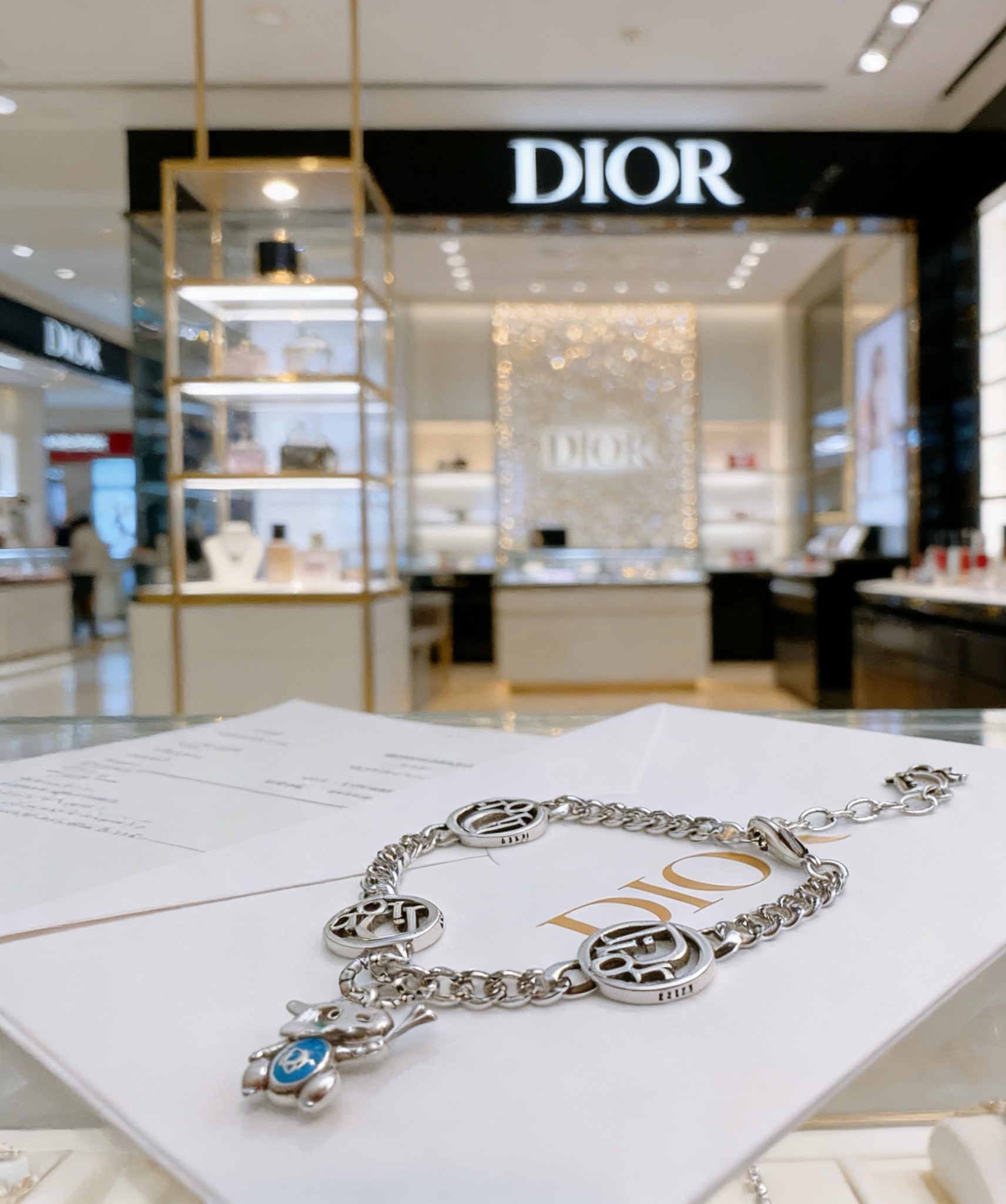 Dior Dior Logo Charm Bracelet with Blue Enamel Elephant Charm bracelet Silver-toned metal with blue enamel accent 18cm with 3cm extension chain