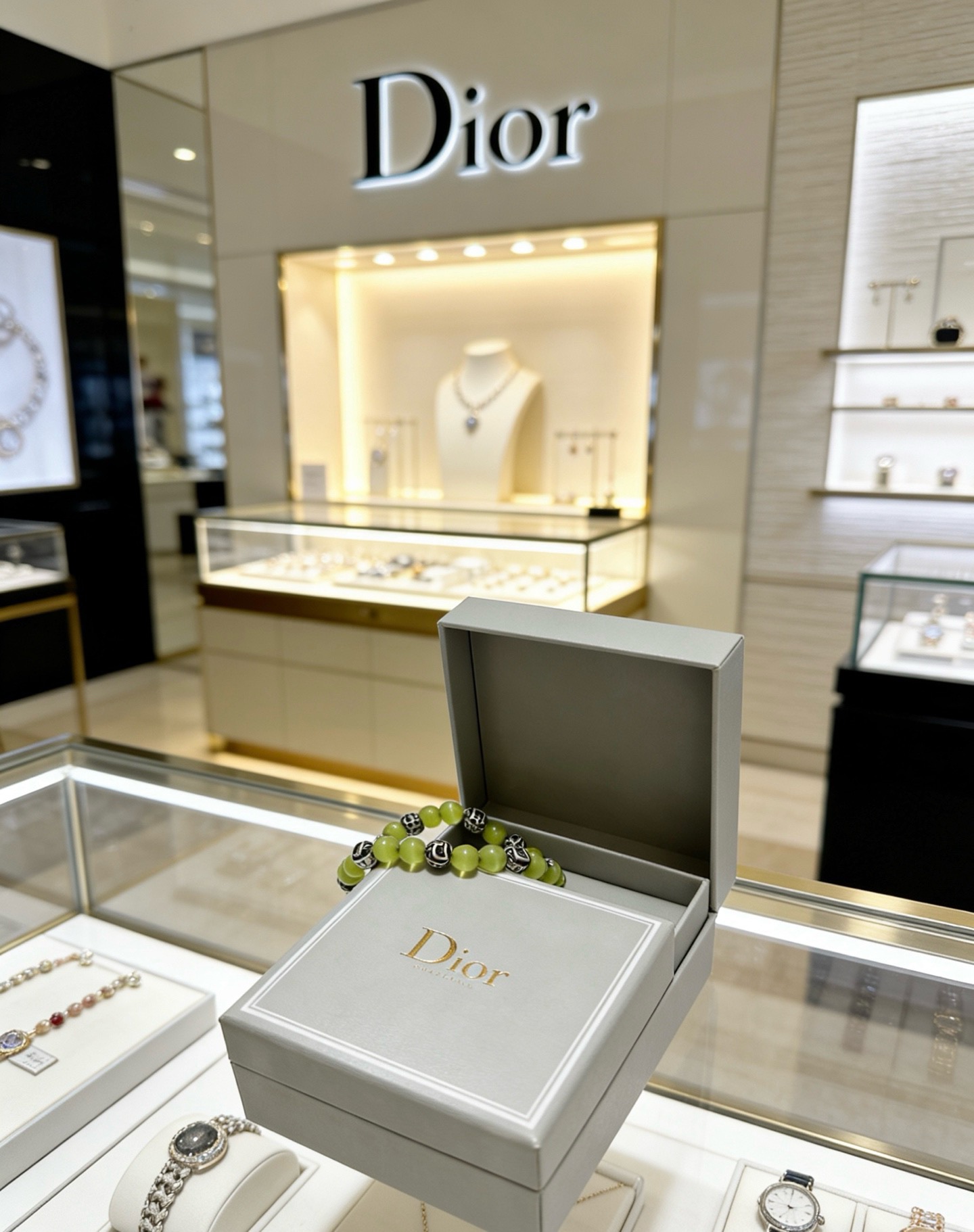 Dior Dior Beaded Logo Bracelet bracelet Silver-tone metal with black enamel logo accents light olive green cat s eye beads 18cm