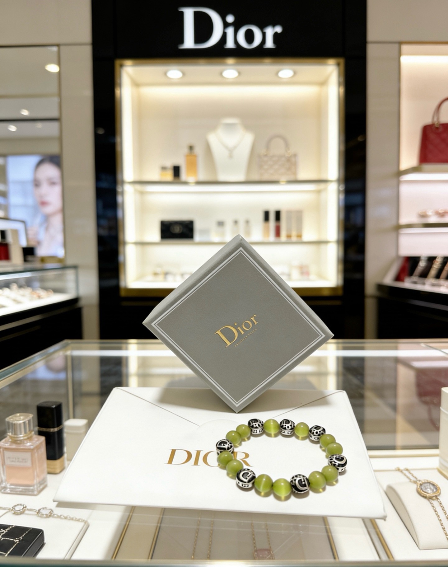 Dior Dior Beaded Logo Bracelet bracelet Silver-tone metal with black enamel logo accents light olive green cat s eye beads 18cm
