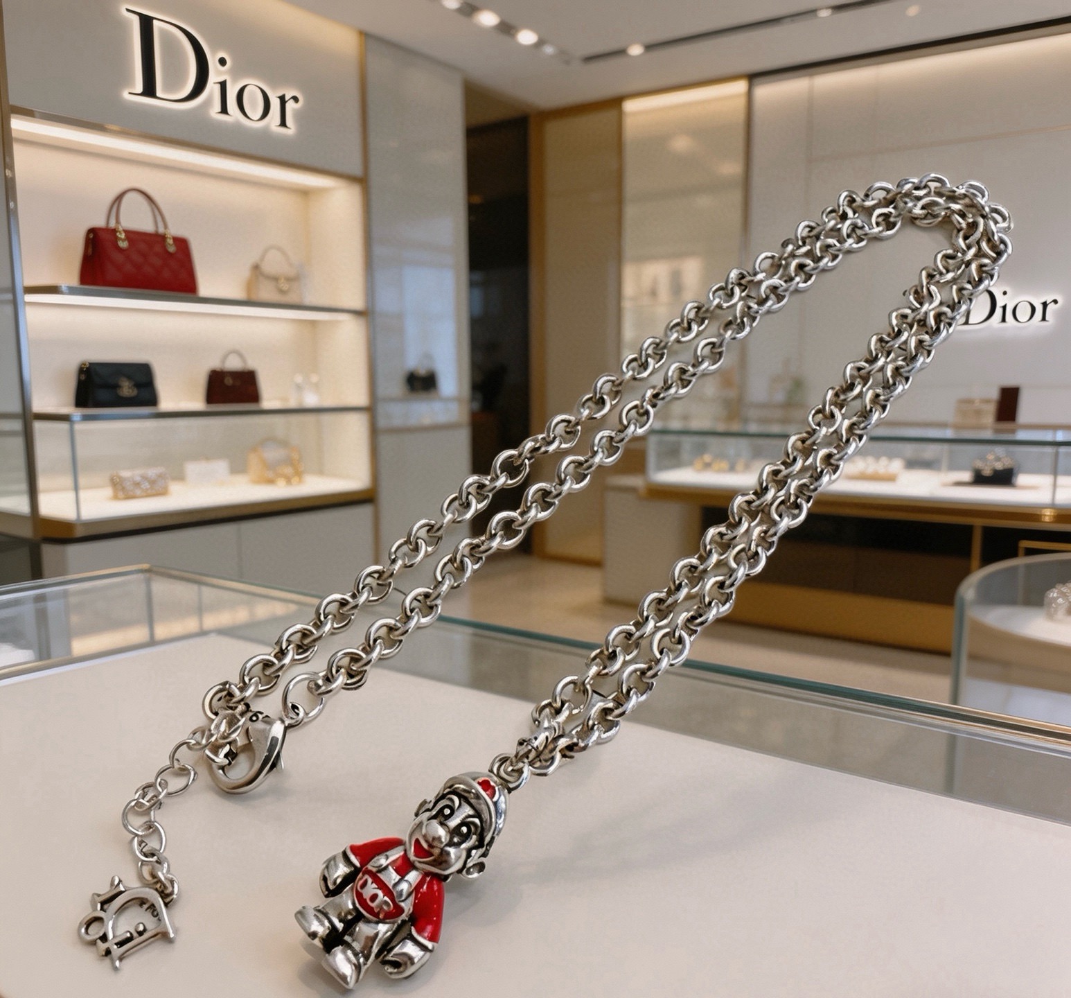 Dior Cartoon Character Pendant Chain Necklace necklace Silver-toned metal with red enamel accents 60cm
