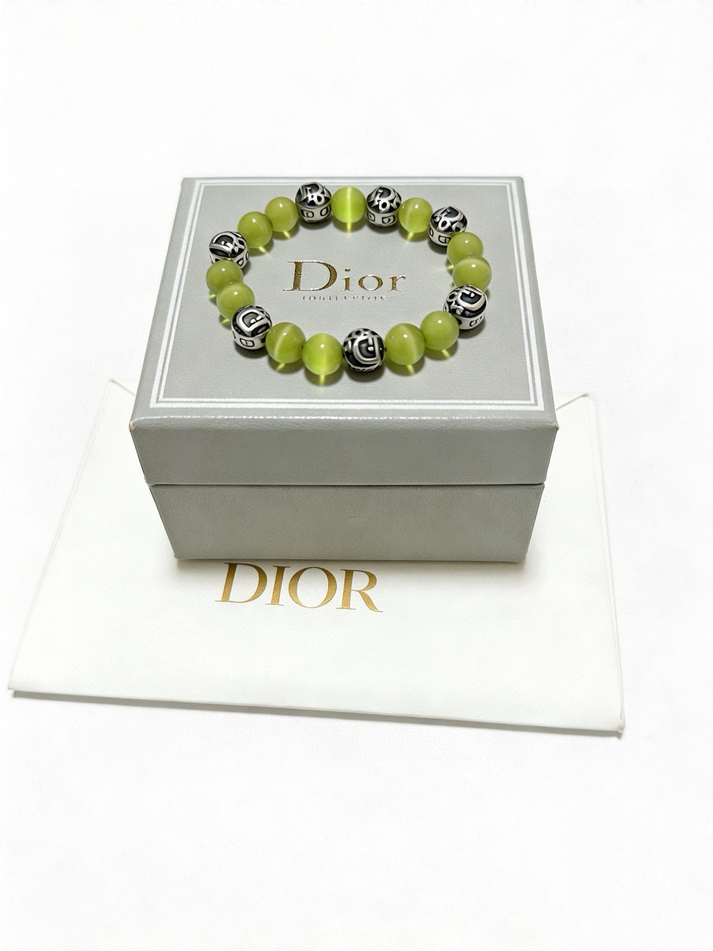 Dior Dior Oblique Logo Beaded Bracelet bracelet Antique silver-tone metal with black enamel accents light lime green cat s eye beads 19cm