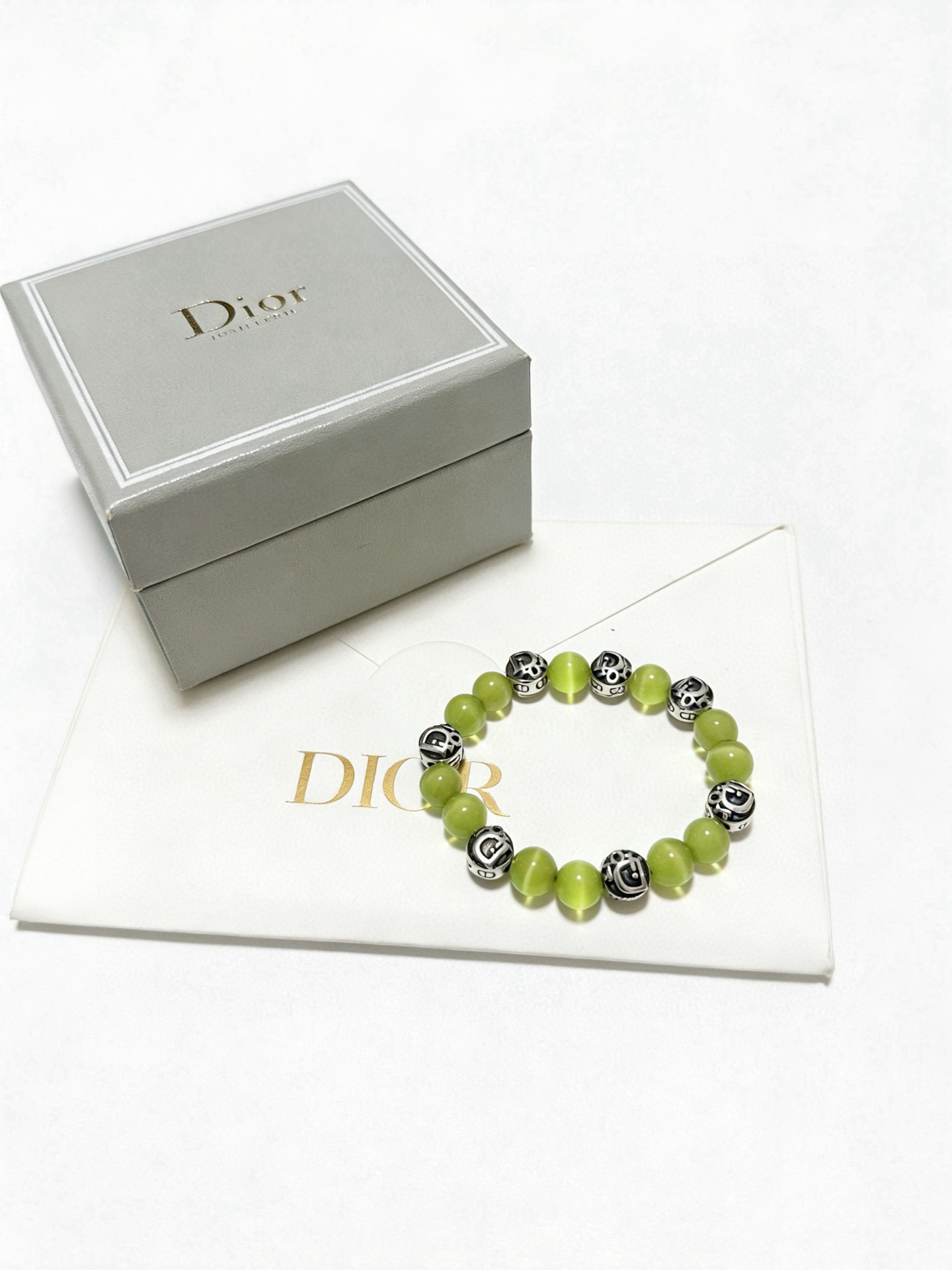 Dior Dior Oblique Logo Beaded Bracelet bracelet Antique silver-tone metal with black enamel accents light lime green cat s eye beads 19cm