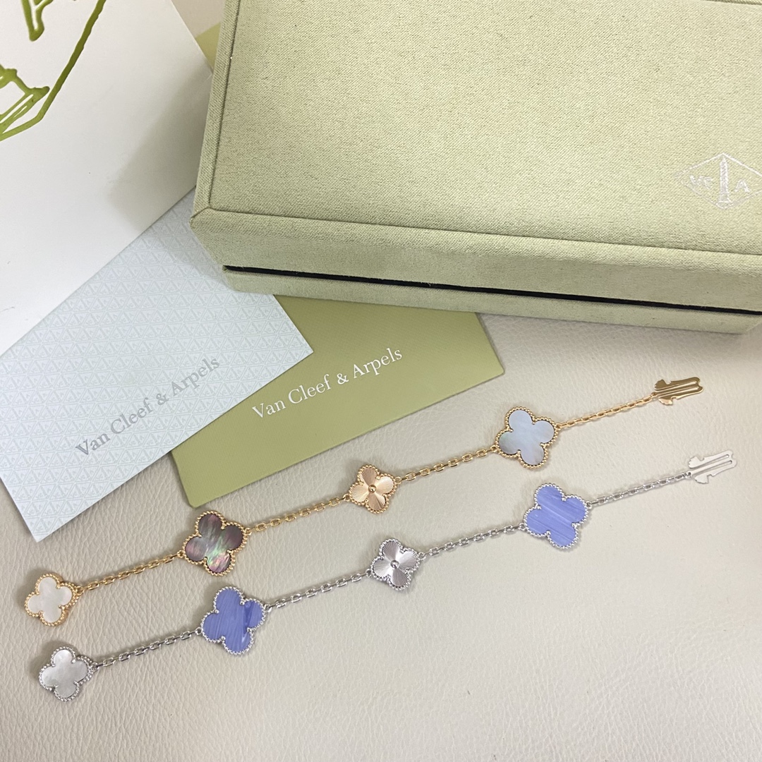 Van Cleef Arpels Alhambra bracelet White gold with white mother-of-pearl chalcedony and guilloche white gold clover motifs 19cm