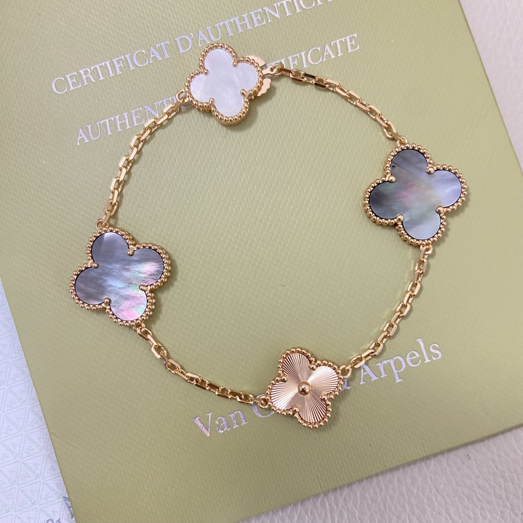 Van Cleef Arpels Alhambra bracelet White gold with white mother-of-pearl chalcedony and guilloche white gold clover motifs 19cm