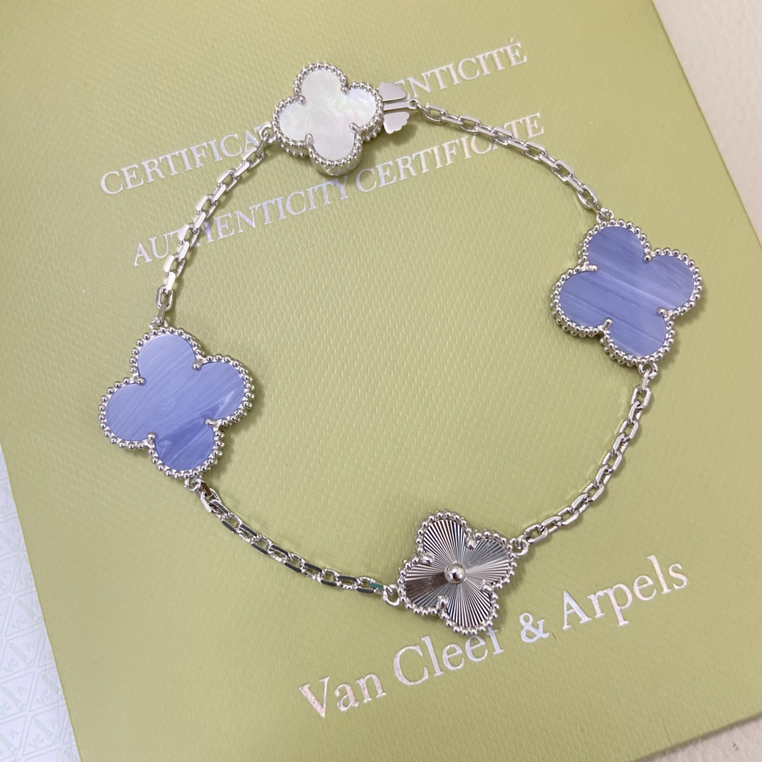 Van Cleef Arpels Alhambra bracelet White gold with white mother-of-pearl chalcedony and guilloche white gold clover motifs 19cm