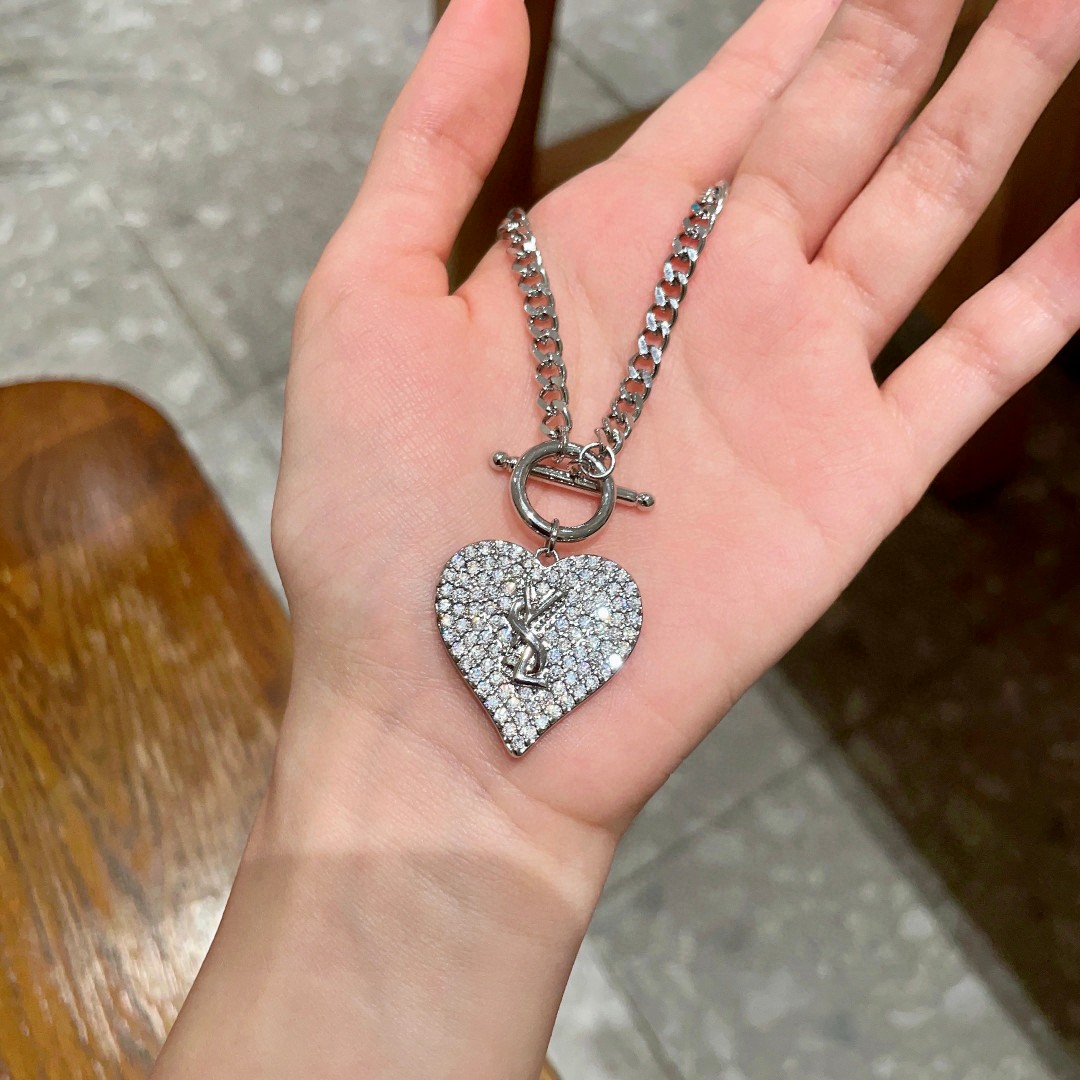 Saint Laurent YSL Logo Pave Heart Toggle Necklace necklace silver-toned metal with clear pave crystal stones 18 inches
